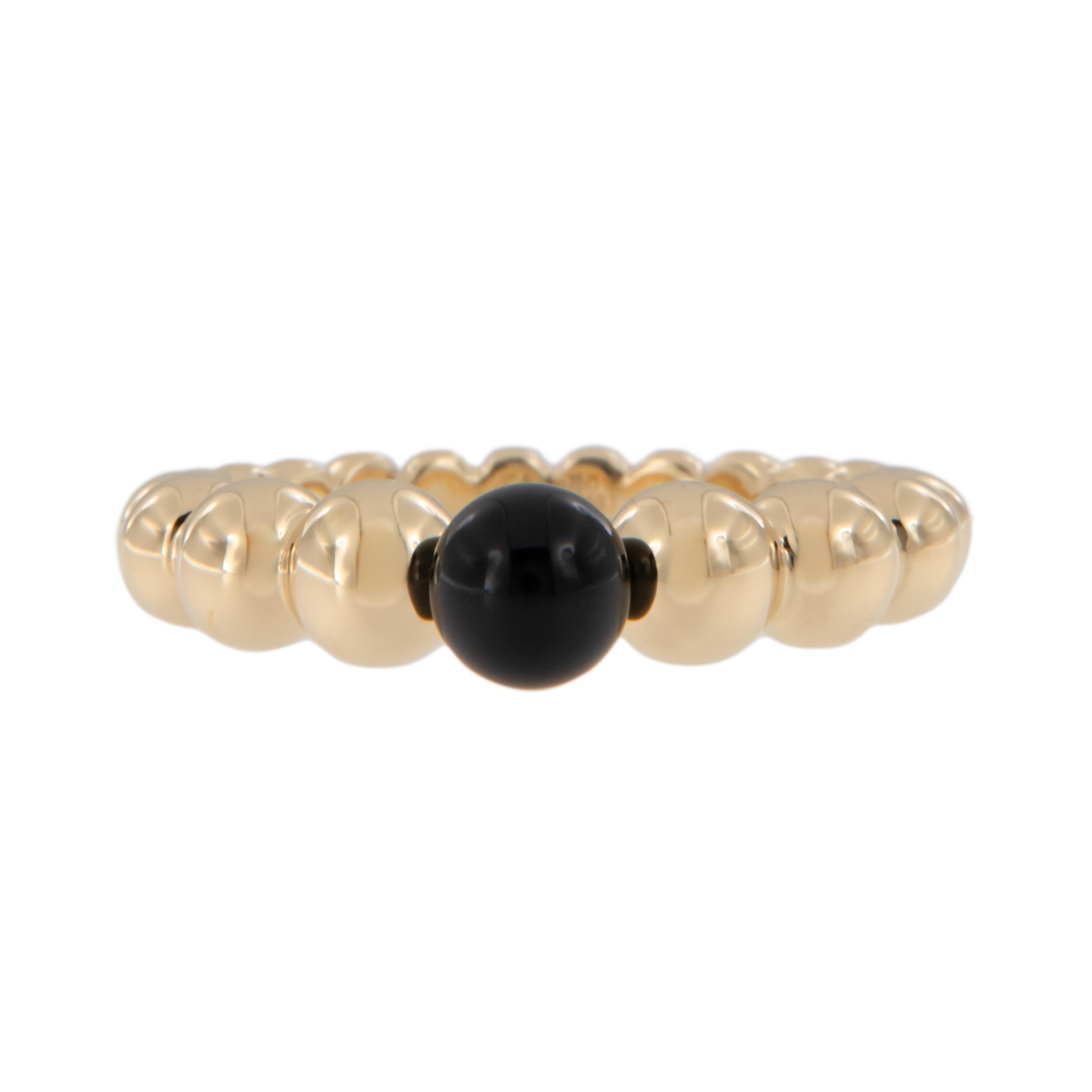 The curved lines of the 18 karat yellow gold beaded ring symbolizes pearls of gold. This lovely ring accentuates a superb center black onyx bead ( 5.3mm) for a dramatic look yet being black it goes with everything. Made in a size 6.5 but can be