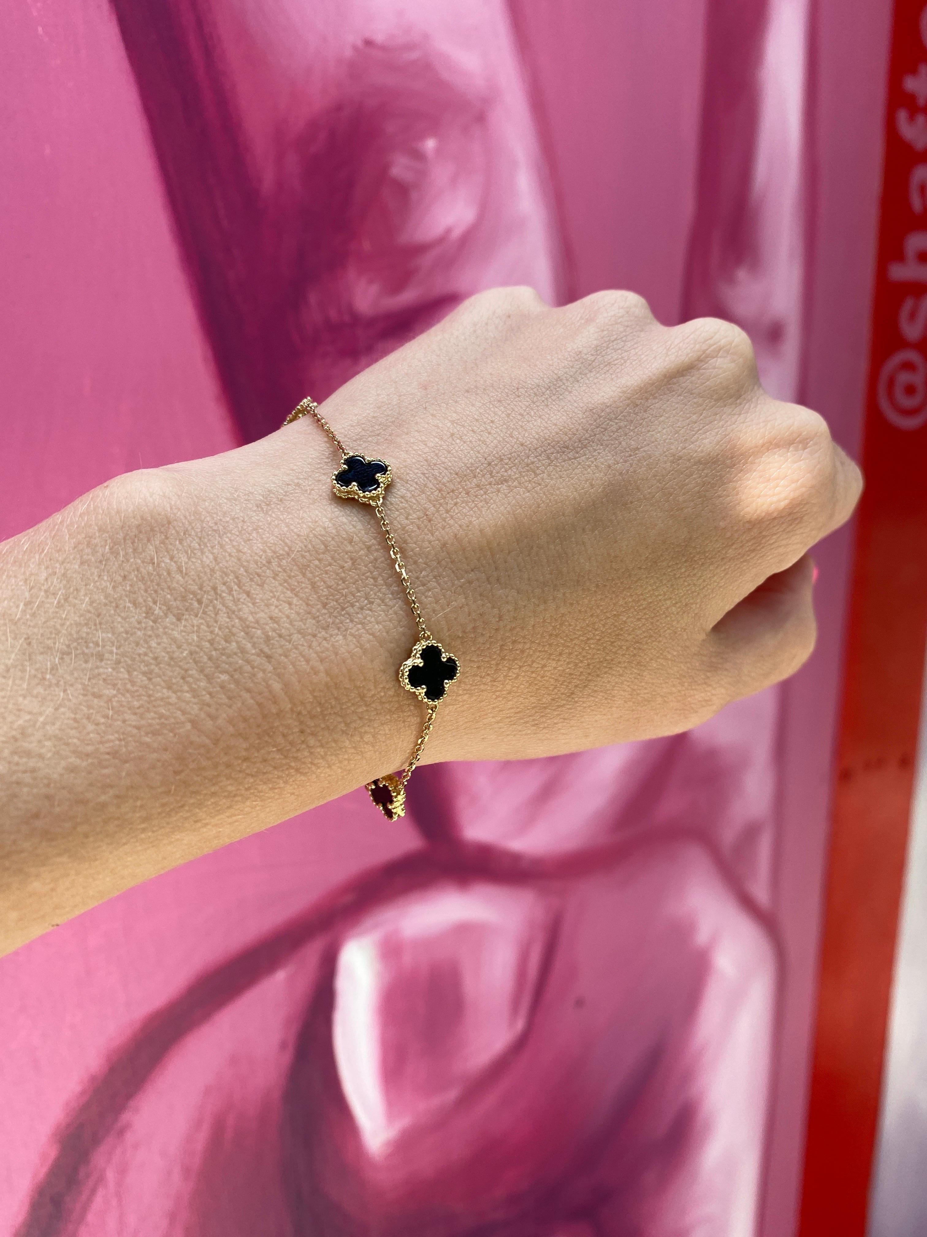 18 Karat Gelbgold Schwarzes Onyx Station-Armband 1