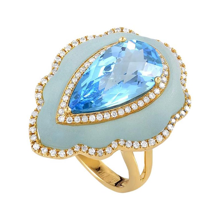 18 Karat Yellow Gold Blue Gemstone and Diamond Ring For Sale at 1stDibs