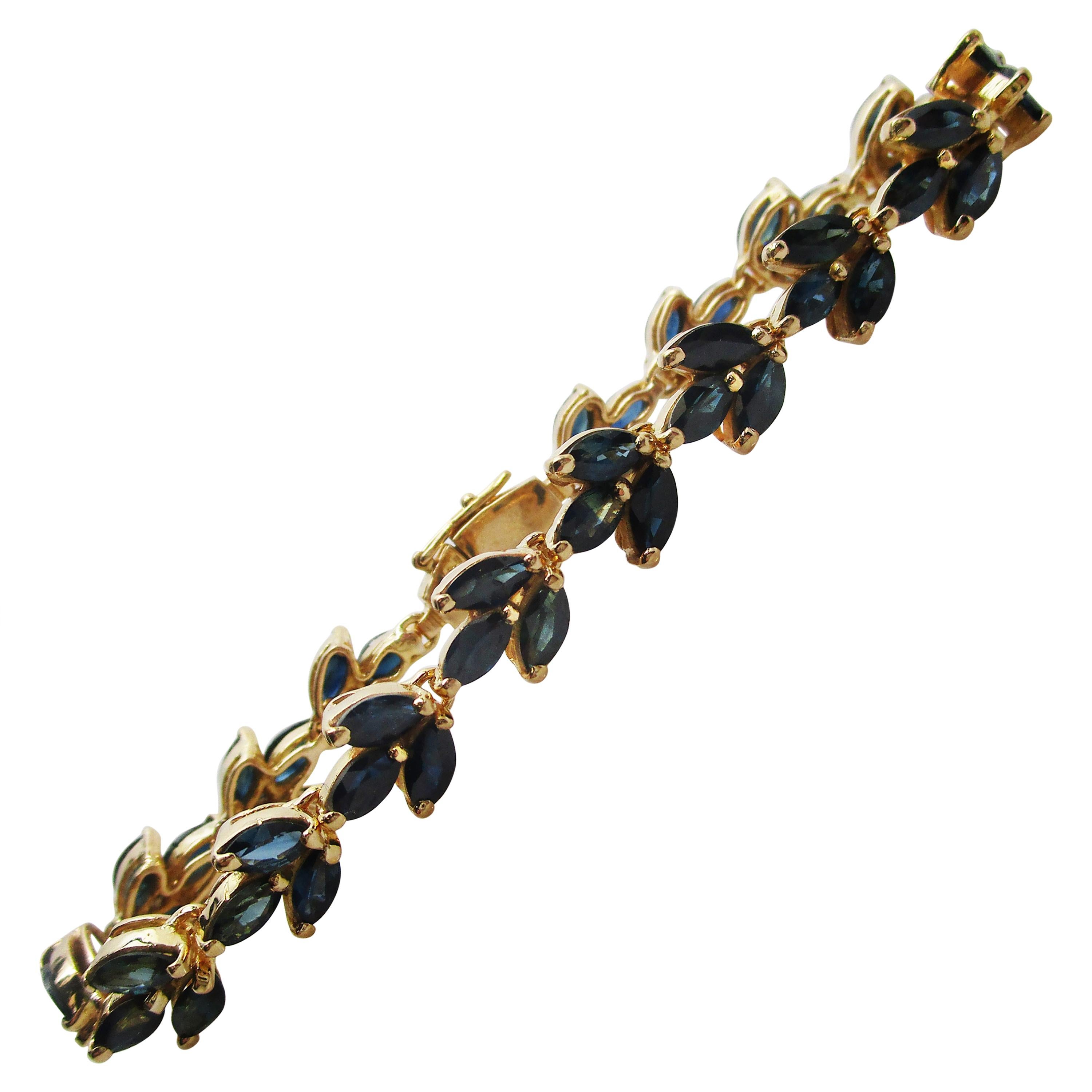 18 Karat Yellow Gold Blue Sapphire Line Bracelet