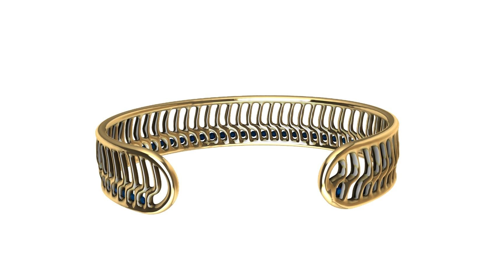 Bracelet manchette vague ouverte en or jaune 14 carats et saphirs bleus 2