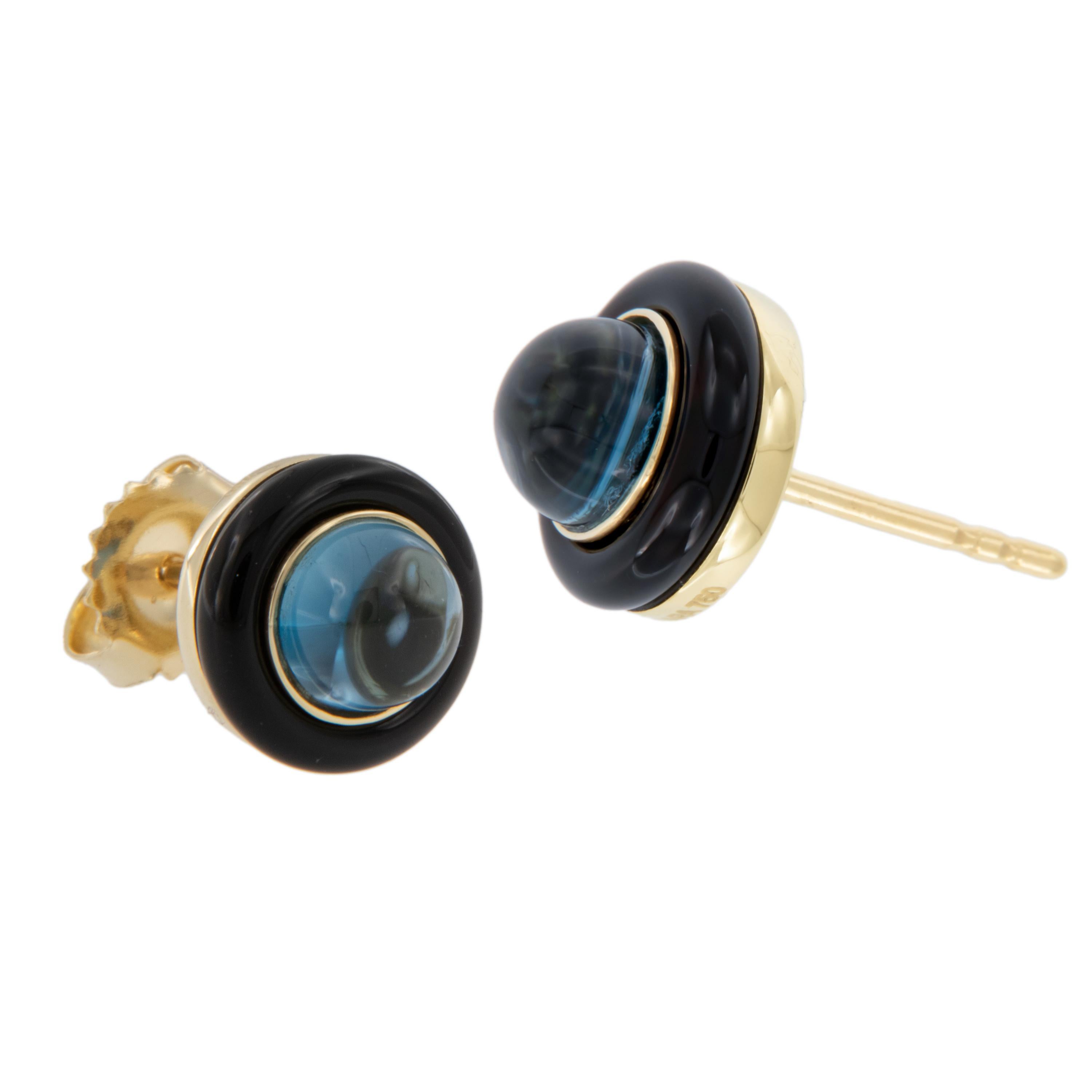 You will love wearing these Limited Edition earrings by Goshwara made from rich 18 karat yellow gold set with 6mm blue topaz cabochon cuts elegantly framed by black onyx for a beautiful contrast! Blue Topaz = 3.02 Cttw, Black onyx = 2.14 Cttw .