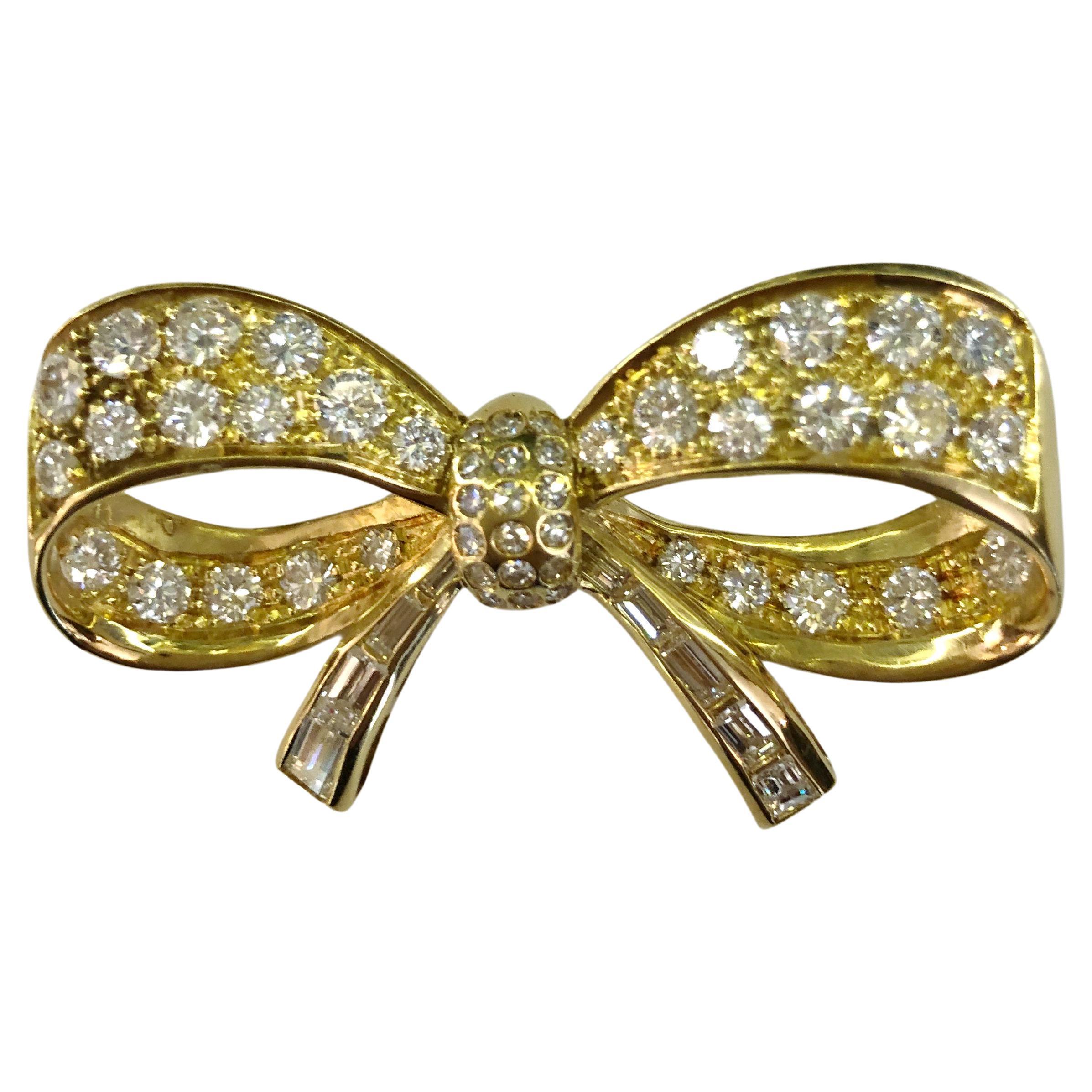 18 Karat Yellow Gold Bow Brooch For Sale