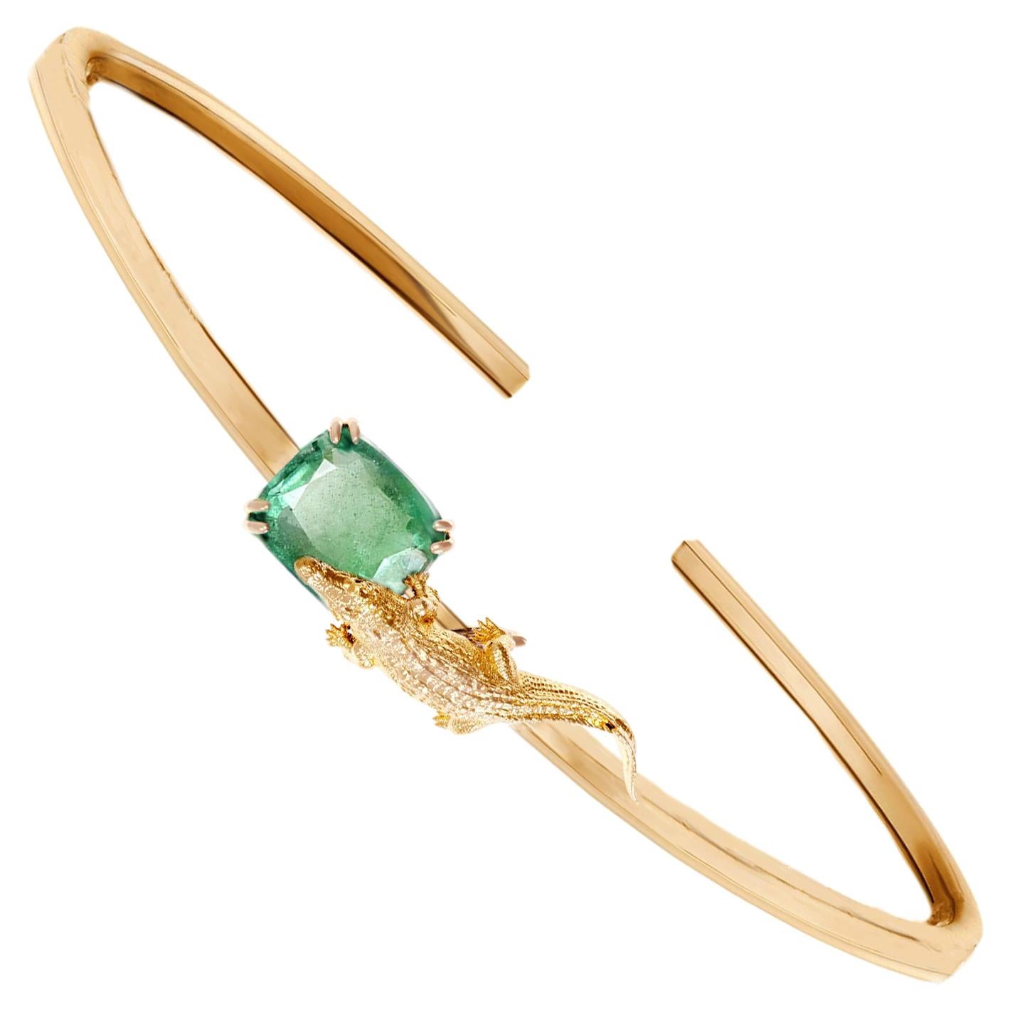 Eighteen Karat Yellow Gold Sculptural Bracelet with Natural Cushion Emerald For Sale