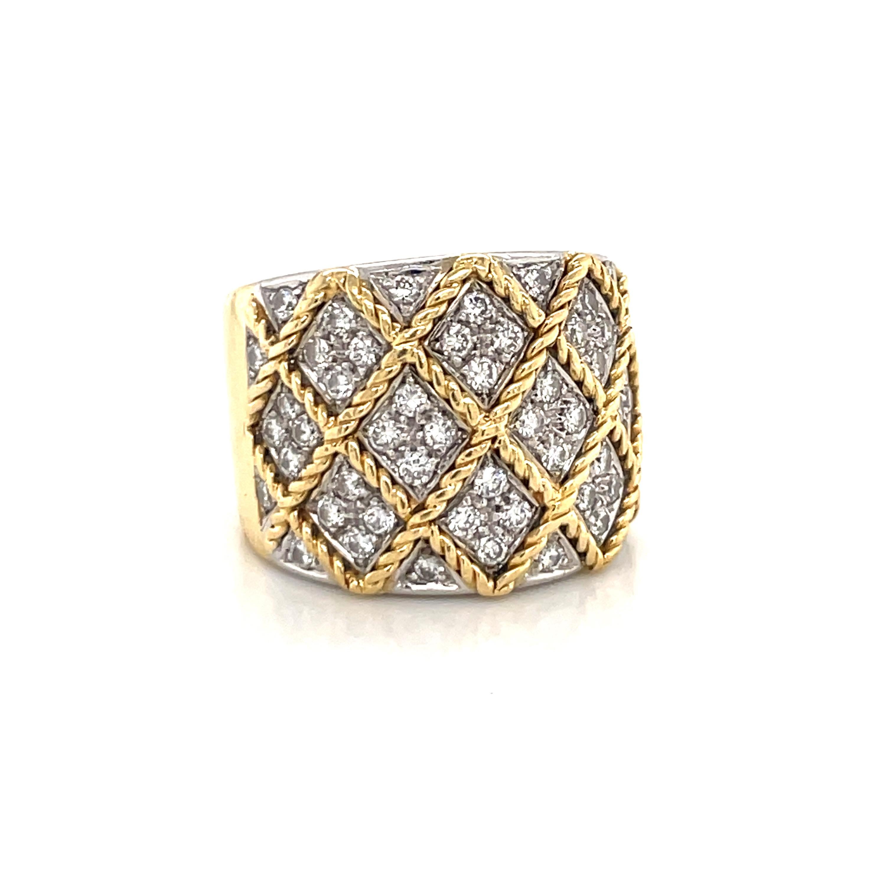 18 Karat Yellow gold wide ring featuring 52 round brilliants weighing 1.02 carats with a gold braided motif, 19.6 Grams.
Very Comfortable on the hand!