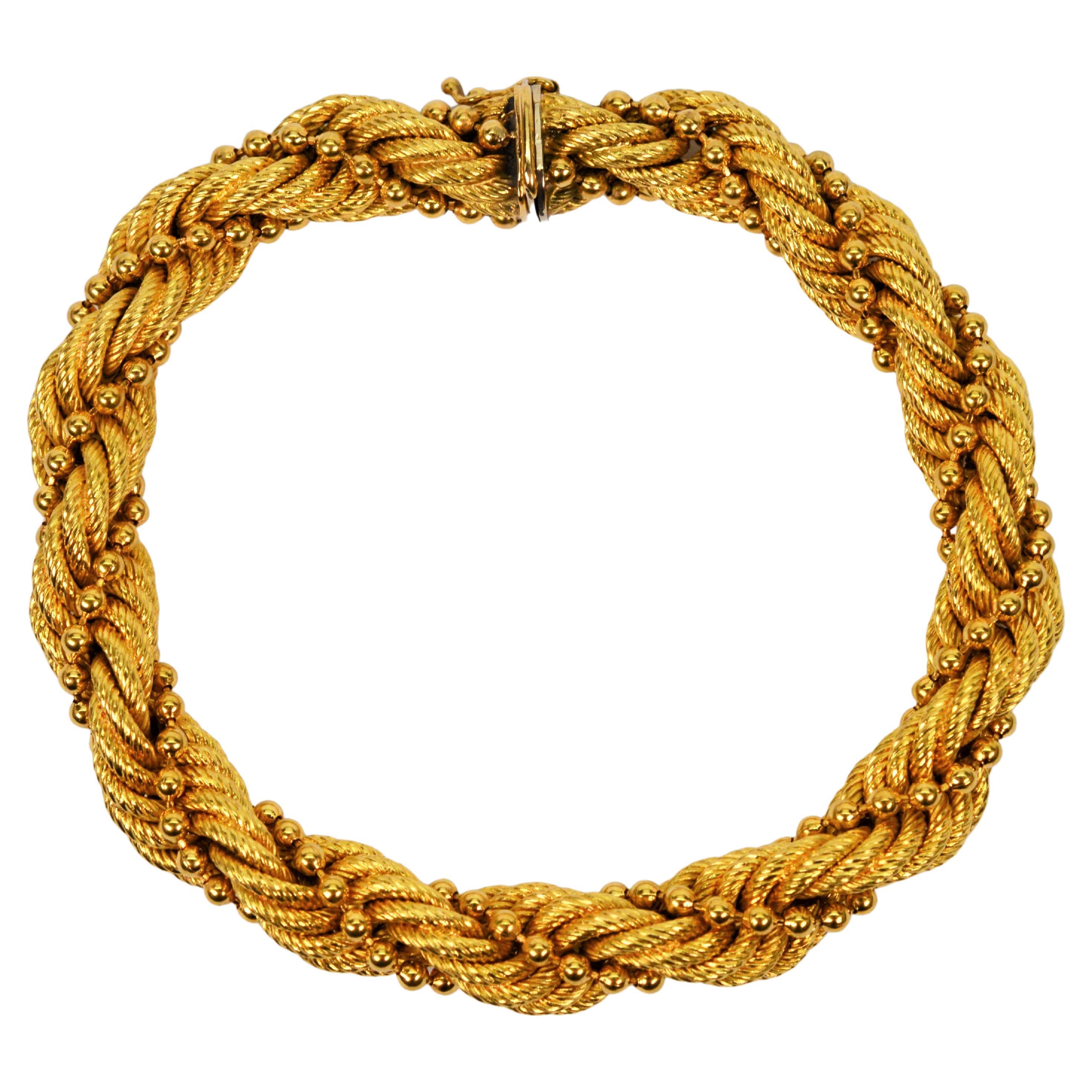 18 Karat Yellow Gold Braided Rope Twist Bracelet For Sale
