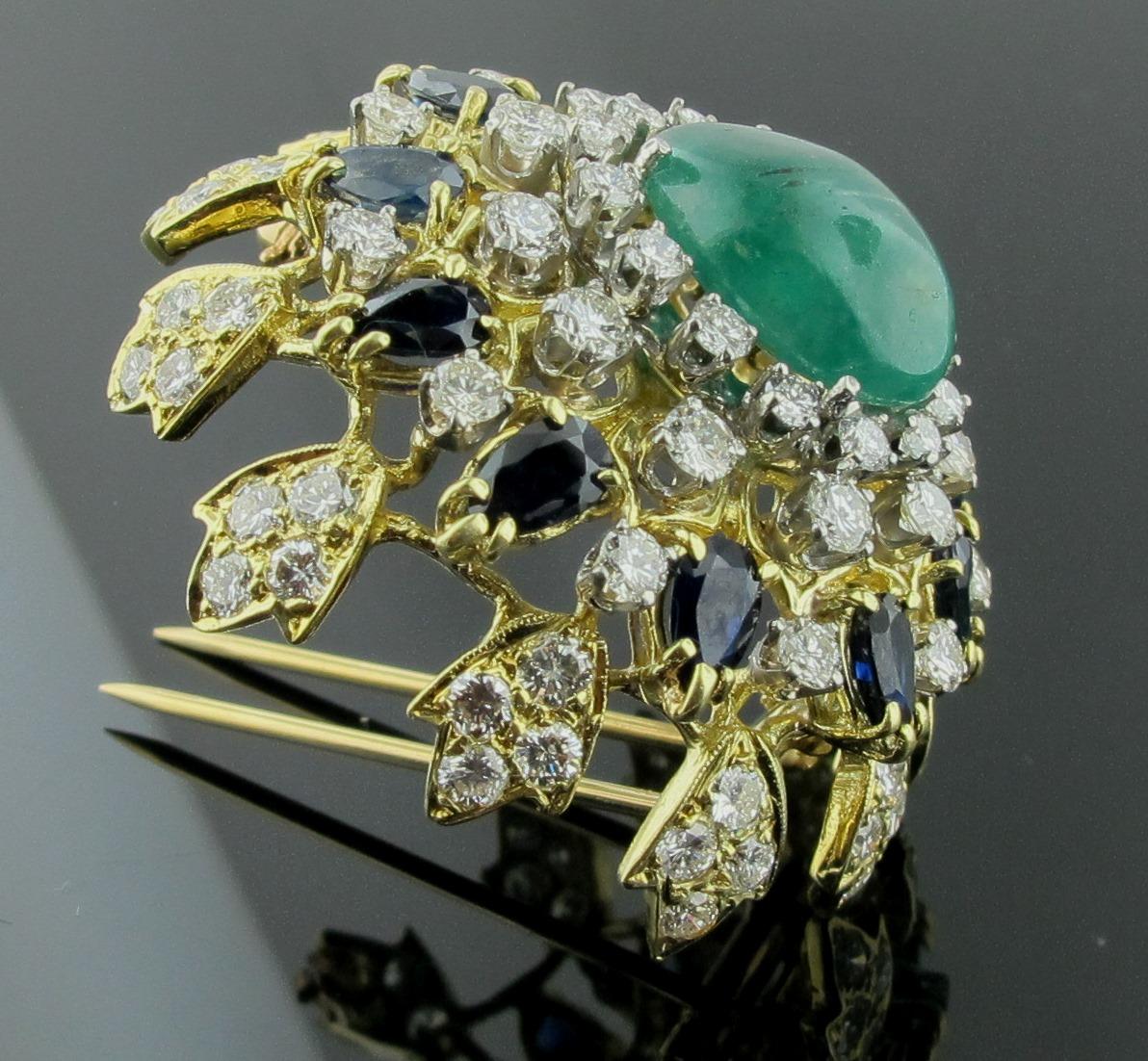 Women's or Men's 18 Karat Yellow Gold Brooch with Diamonds, Sapphires and a Cab Emerald Center For Sale
