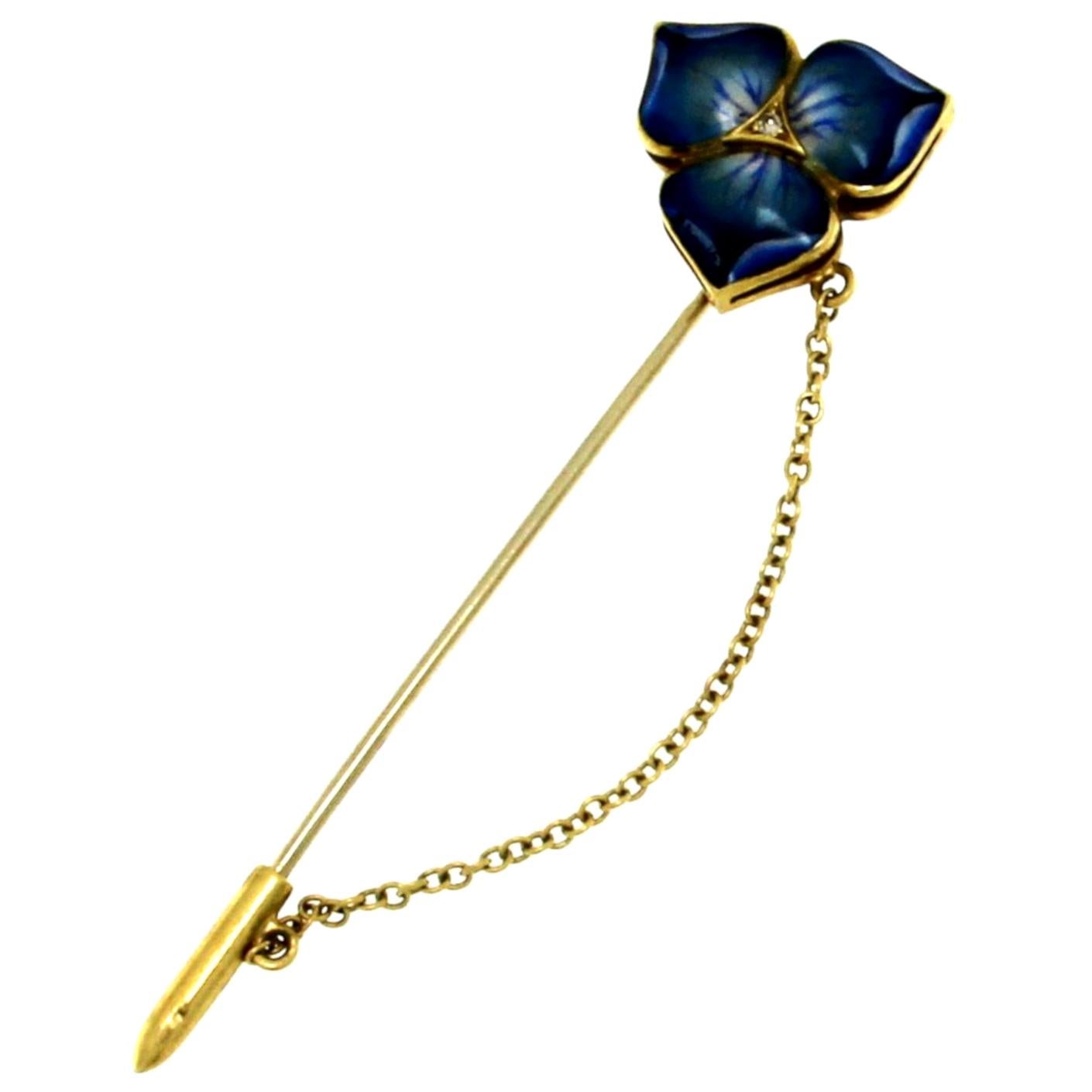 Brosche aus 18 Karat Gelbgold mit emaillierter Blume und Diamant in der Mitte im Angebot