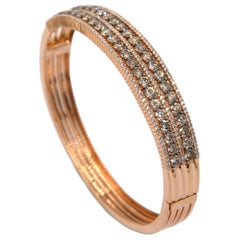 Garavelli-Armband aus 18 Karat Roségold mit braunen und weißen Diamanten