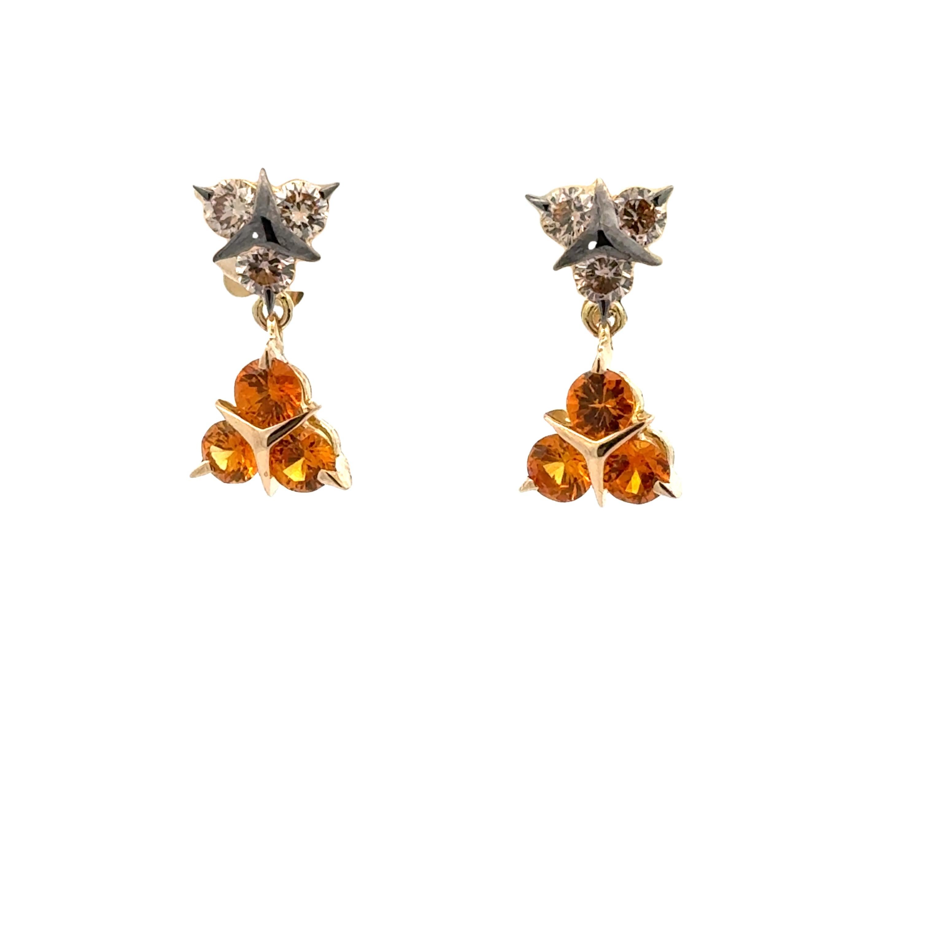 Garavelli  boucles d'oreilles en  très unique et joli design, en or jaune 18 kt avec six diamants bruns ronds parfaits pour un poids total en carats de 0,58 et six saphirs jaunes pour ct 1,12 en or 18kt  grs : 4.31
 Fabriqué en Italie à