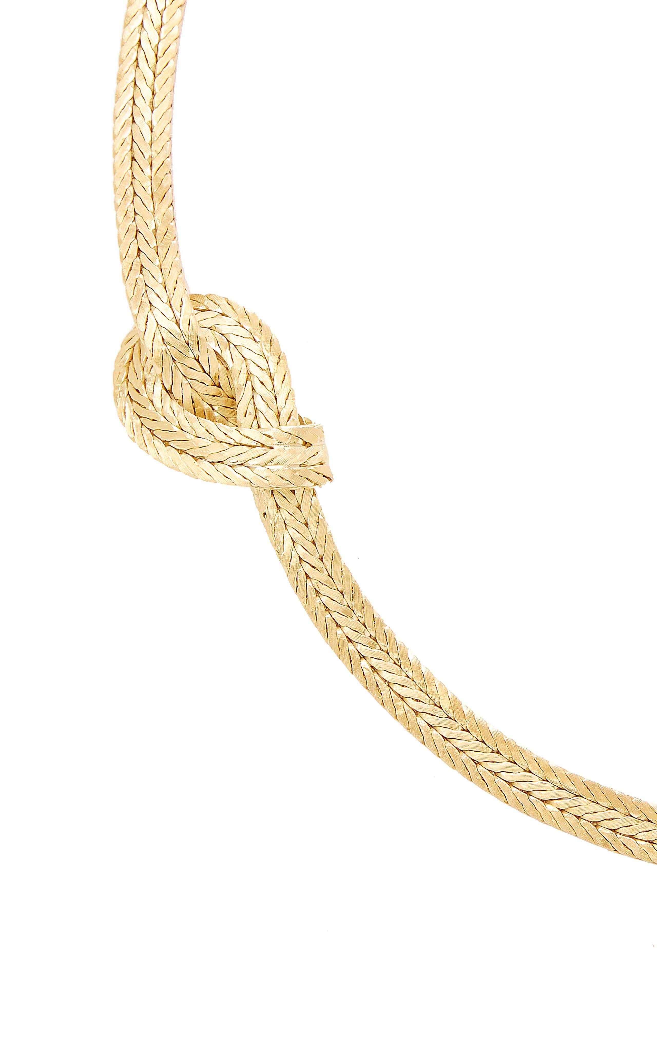 The Italian Jewellery House of Buccellati - everything they create is fashionable, iconic and so desirable. This chic and stylish necklace is finely crafted in 18k yellow gold in a detailed triple row herringbone design complete with two large knots