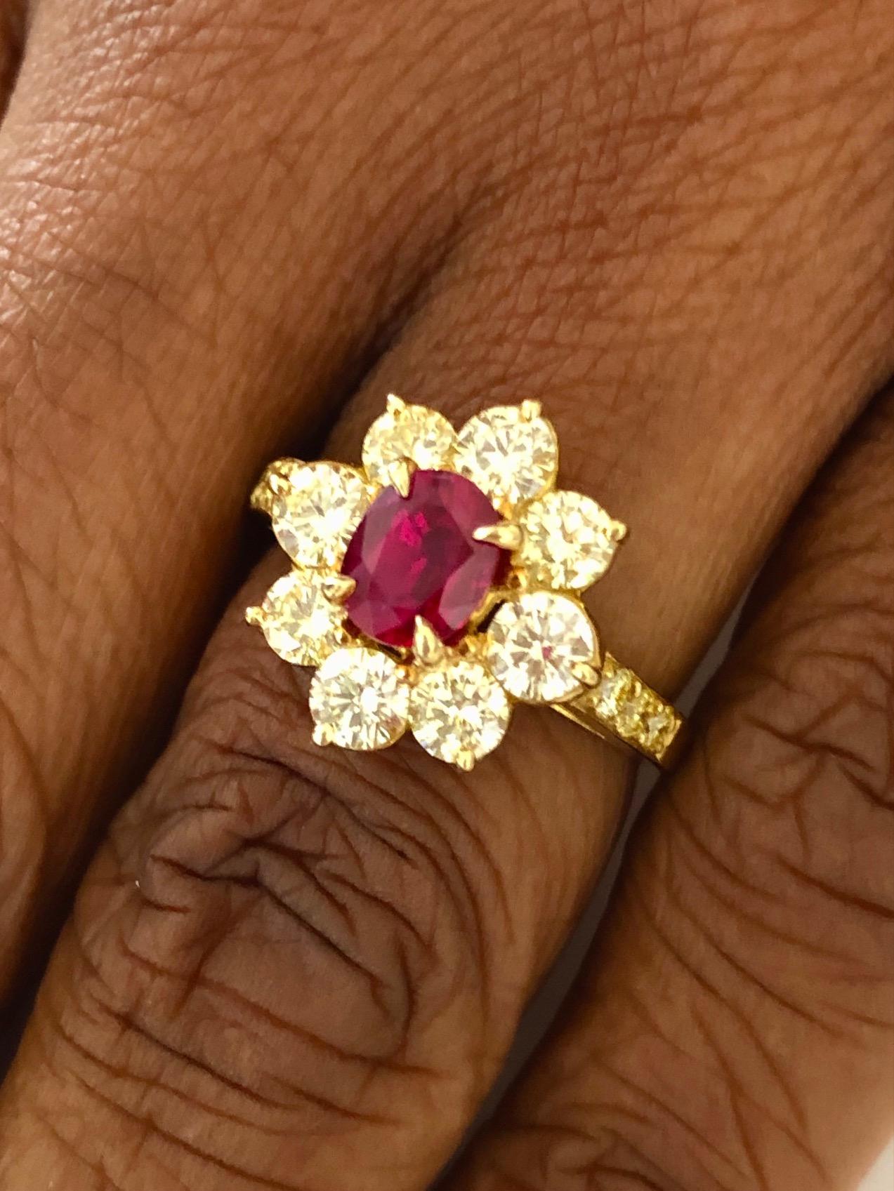 Fine 18K Yellow fold Ring, set with a Red Burma Ruby 1.04 carats and 14 Diamonds 1.47 carats.

We design and manufacture our jewelry in our workshop, located in New York City's diamond district.