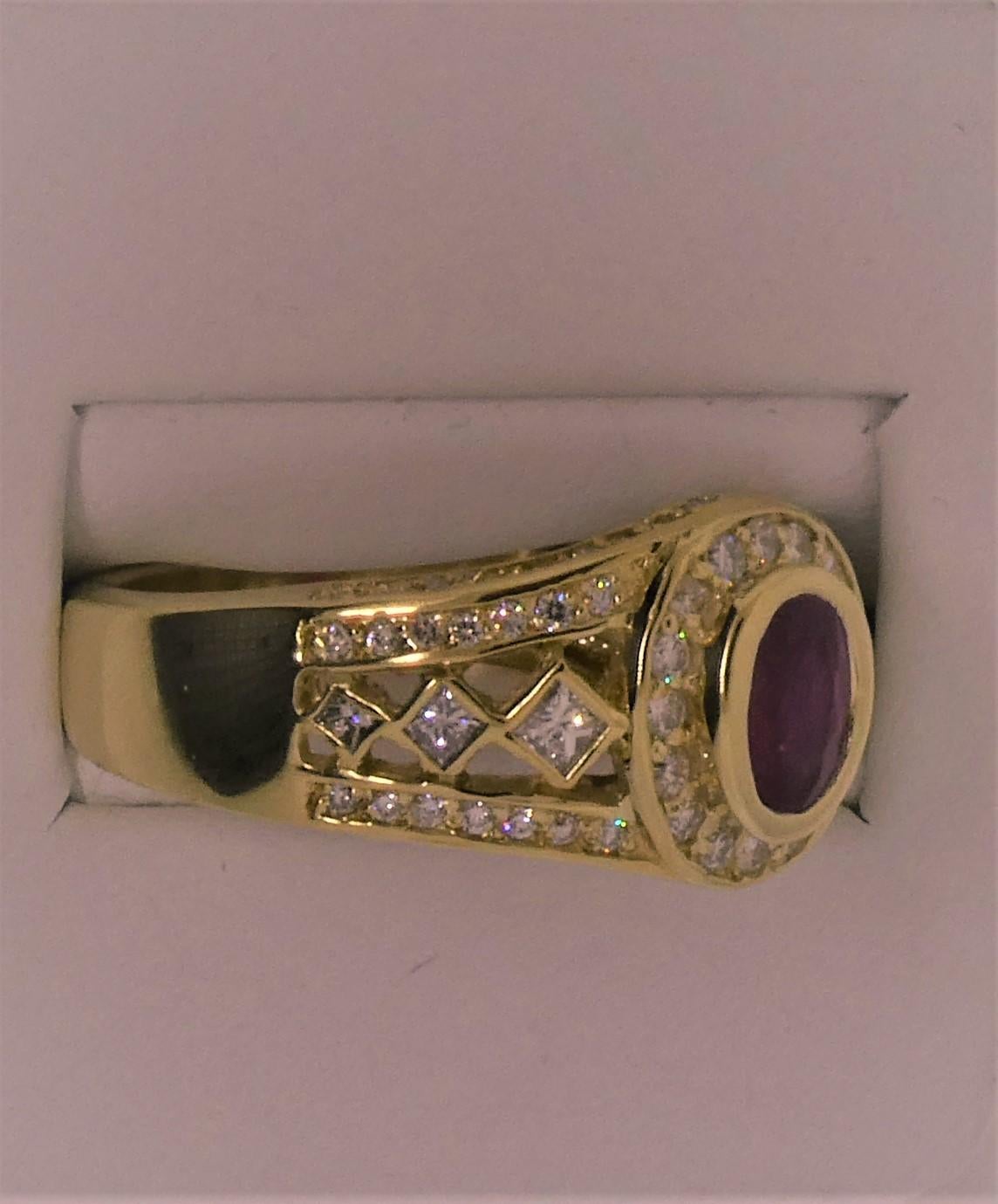 This 18 Karat yellow gold ring, contains a Burmese Ruby measuring 7.08 x 5.81 x 2.68 mm.  As we did not make the ring, we estimate the weight of the Ruby at 0.85 carats.  The ruby is certified by the Gemological Institute of America as Burmese