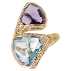 Bypass-Ring aus 18-karätigem Gelbgold mit einem blauen Topas von 7,64 Karat und 3,20 Karat. Amethyst