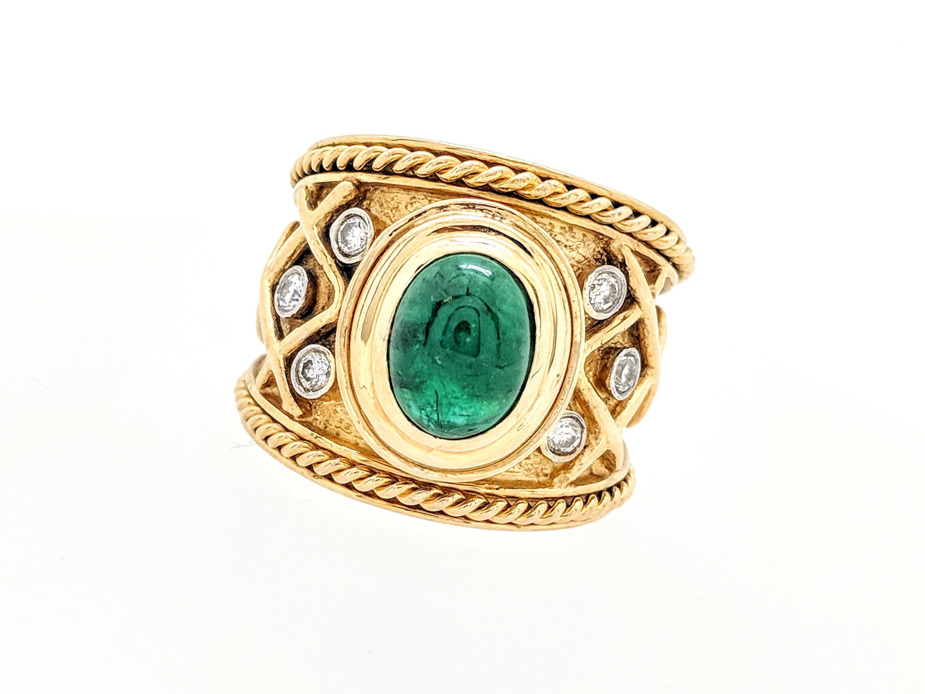 You are viewing a gorgeous Cabochon Emerald & Diamond ring. The ring is crafted from 18k yellow gold and weighs 18 grams. It features (1) 9x7mm natural cabochon cut emerald and (6) .04ct round natural brilliant cut diamonds. These diamonds are