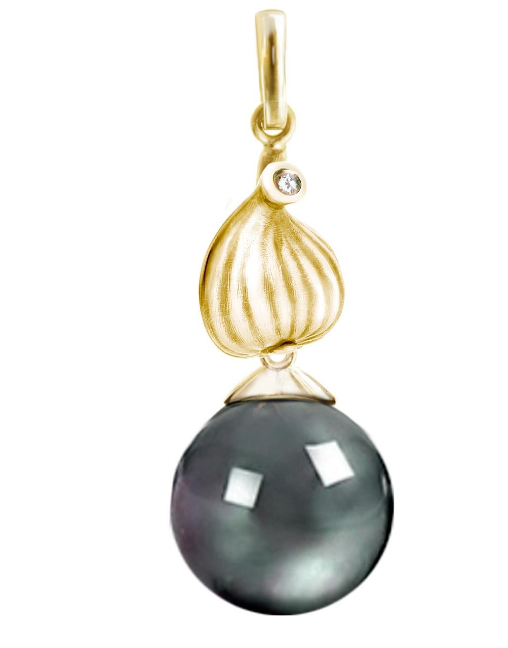 These Fig drop earrings are made of 18 karat yellow gold with detachable 11 mm Tahitian black pearls and two diamonds. These earrings were designed by the artist and were featured in a review by Vogue UA. We use top-quality natural diamonds with a