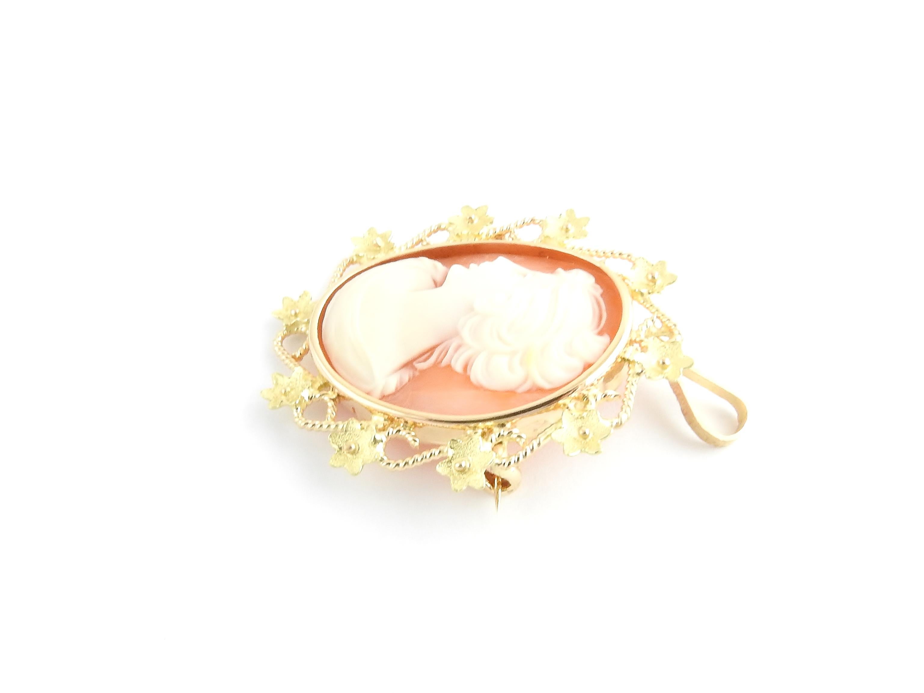Vintage 18 Karat Yellow Gold Cameo Brooch/Pendant

This lovely cameo features a lovely lady in profile framed in beautifully detailed 18K yellow gold. Can be worn as a brooch or a pendant.

Size: 40 mm x 37 mm

Weight: 6.4 dwt. / 10.0 gr.

Stamped: