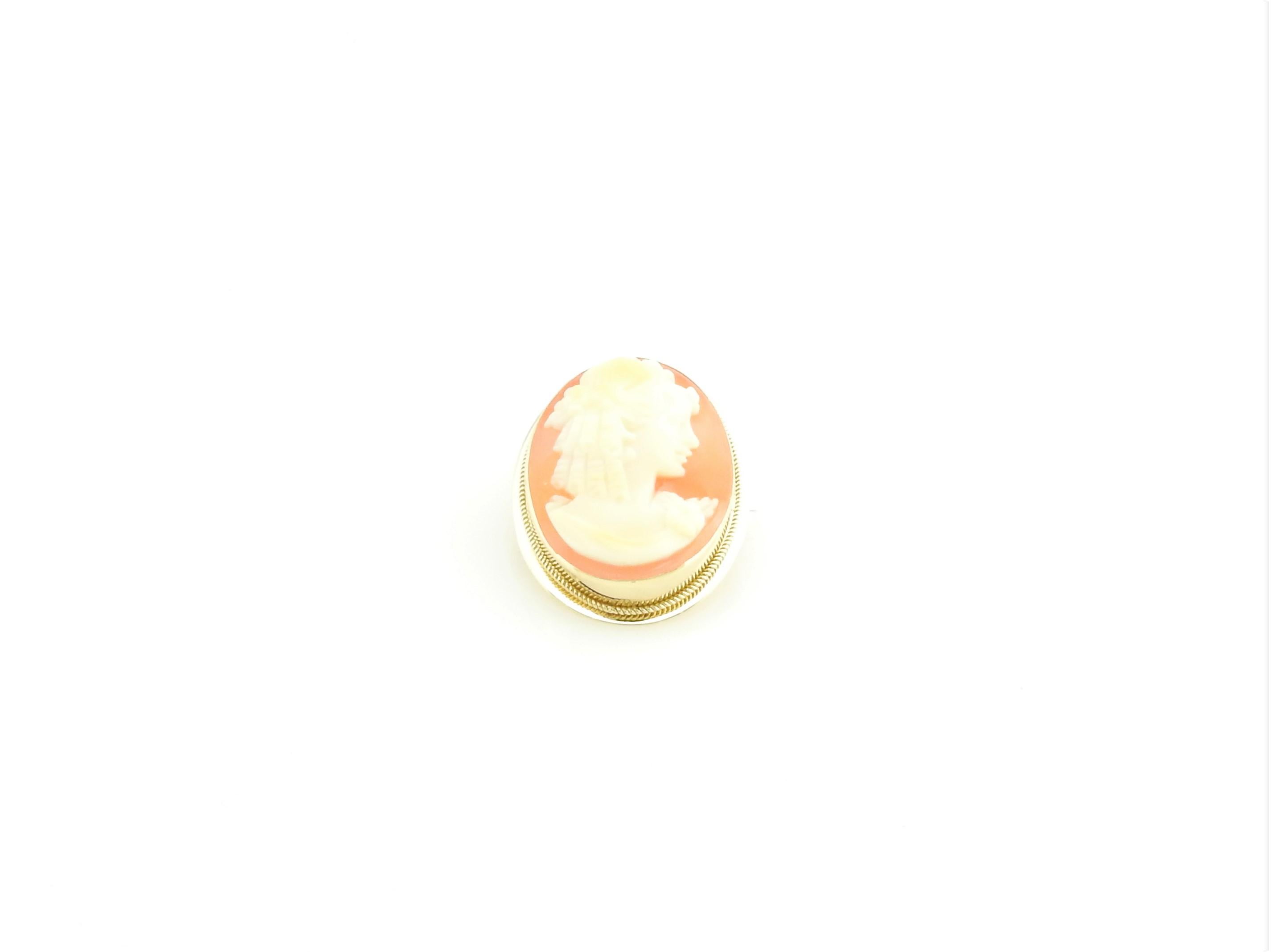 Vintage 18 Karat Yellow Gold Cameo Pendant/Brooch

This elegant cameo features a lovely lady in profile framed in beautifully detailed 14K yellow gold. Can be worn as a brooch or a pendant.

Size: 22 mm x 17 mm

Weight: 2.3 dwt. / 3.6 gr.

Stamped: