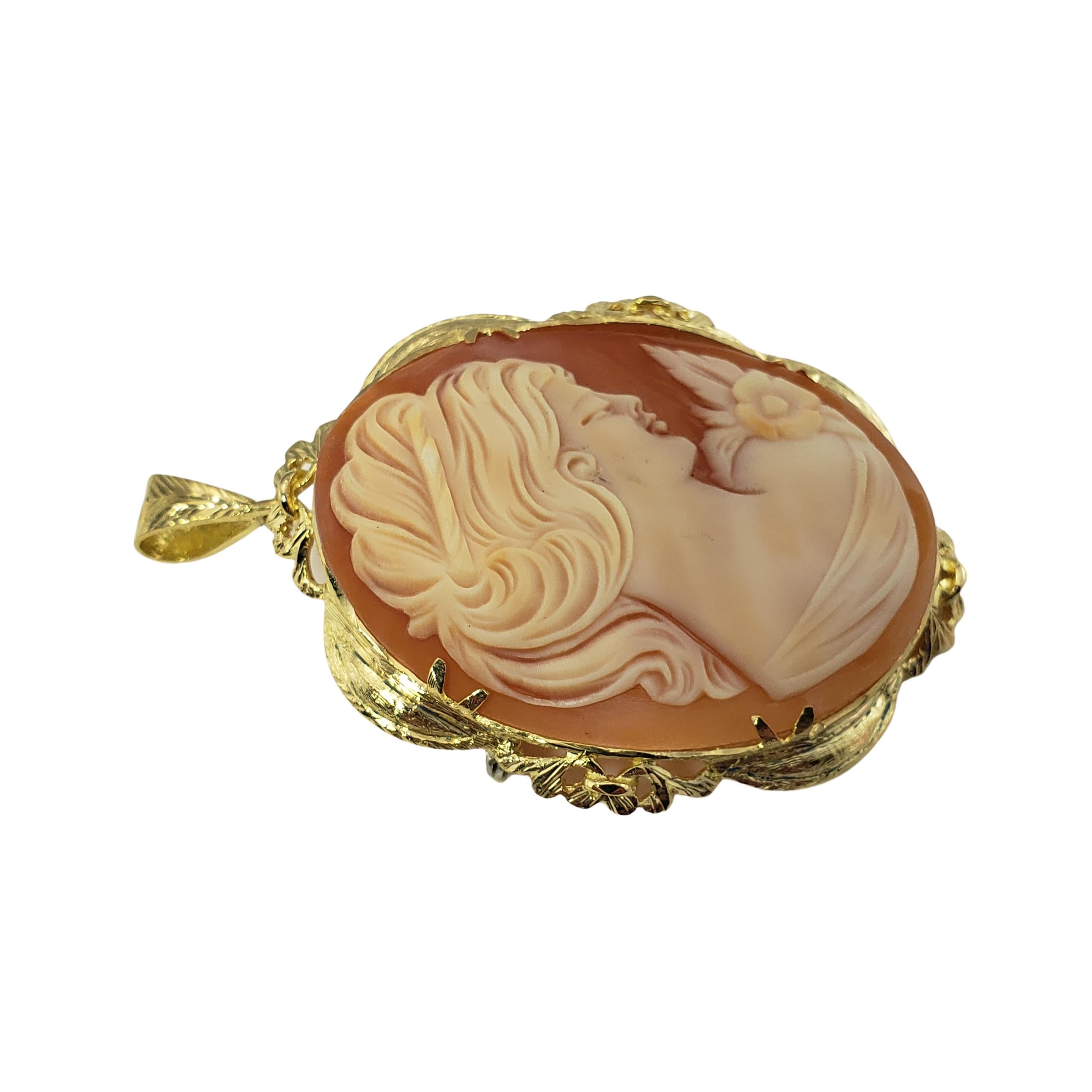 18 Karat Yellow Gold Cameo Brooch/Pendant-

This elegant cameo features a lovely lady in profile set in beautifully detailed 18K yellow gold.  Can be worn as a brooch or a pendant.

Size: 47 mm x 38 mm

Weight:  7.7 dwt. /  12.0 gr.

Stamped: