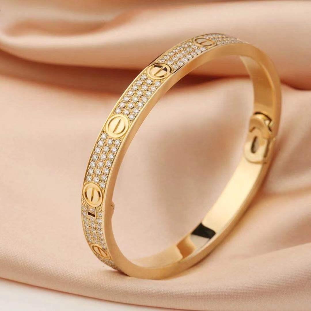 diamond paved 18 karat yellow gold