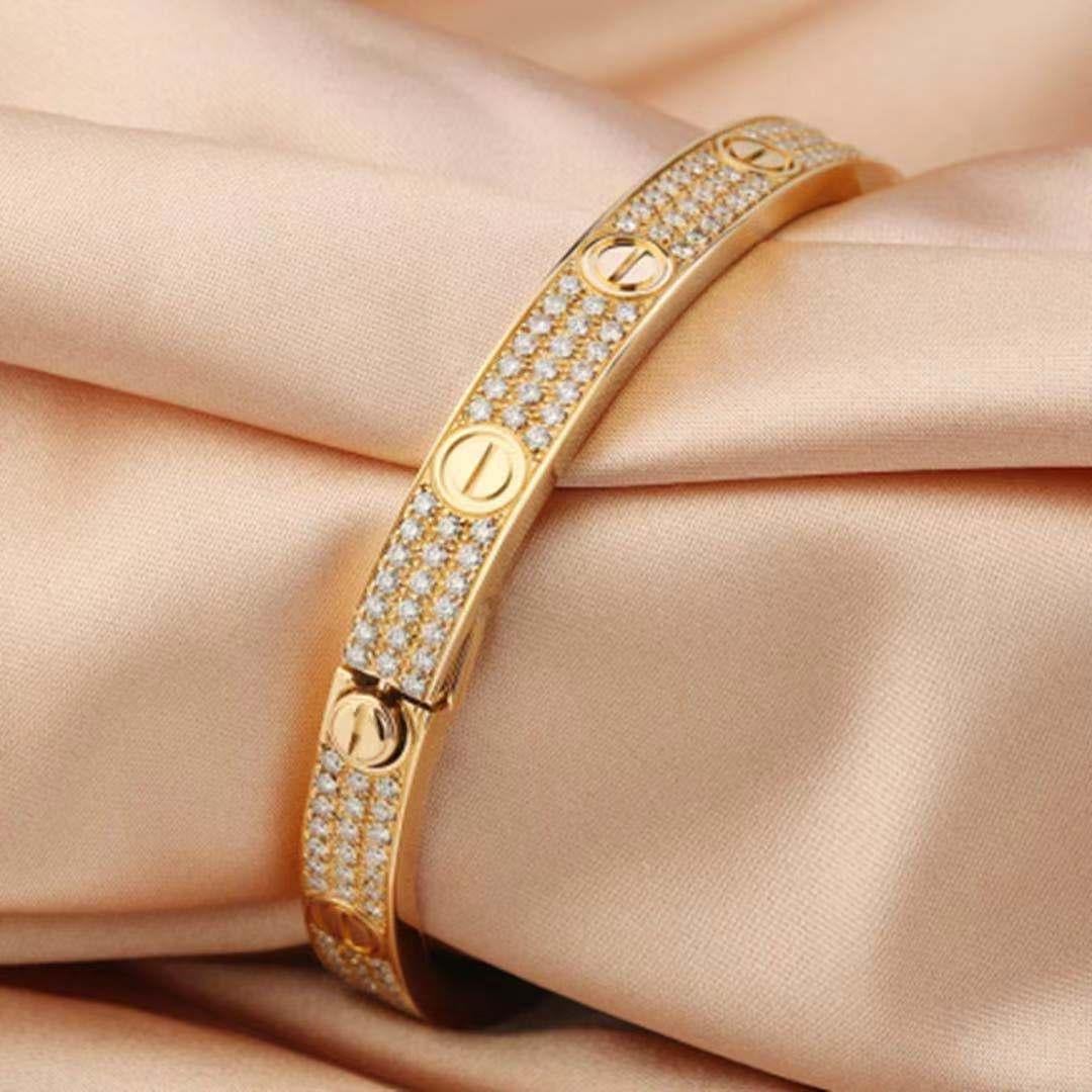 18 Karat Yellow Gold Cartier Love Bracelet with Pave Diamonds In Excellent Condition In Banbury, GB