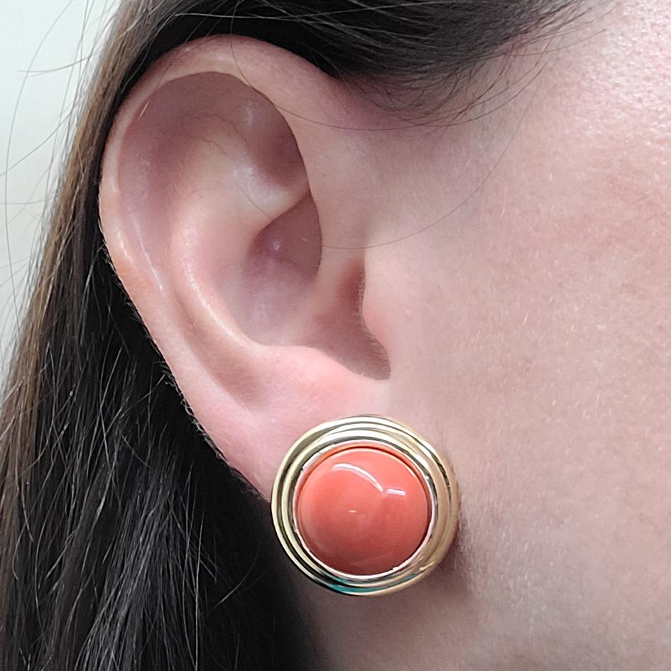 18 Karat Yellow Gold Cellino Coral Cabochon Stud Earrings With Pierced Post & Omega Clip Backs. Finished Weight is 19.7 Grams. Post Can Be Removed Upon Request For Non-Pierced Ears.