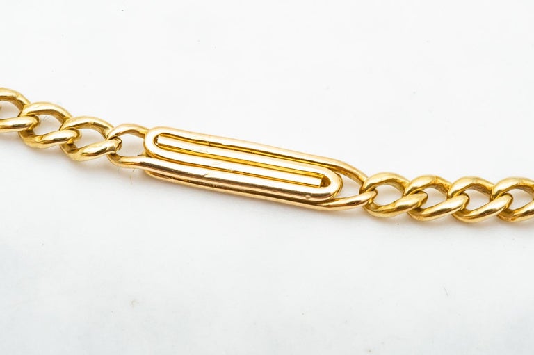 18 Karat Yellow Gold Chain with 2 Decorations In Excellent Condition For Sale In Vannes, FR