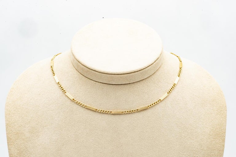 18 Karat Yellow Gold Chain with 2 Decorations For Sale 1