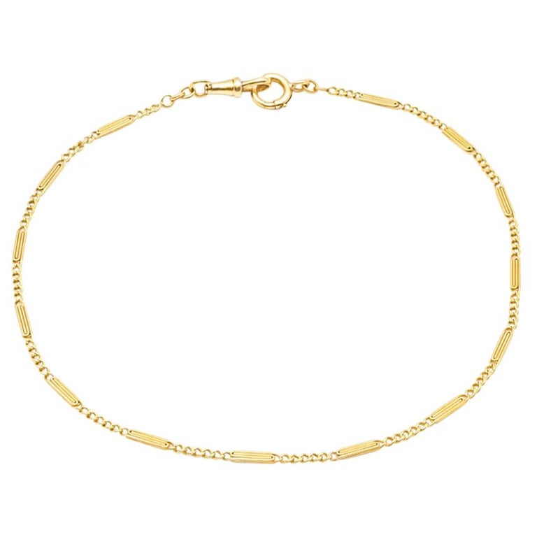 18 Karat Yellow Gold Chain with 2 Decorations For Sale