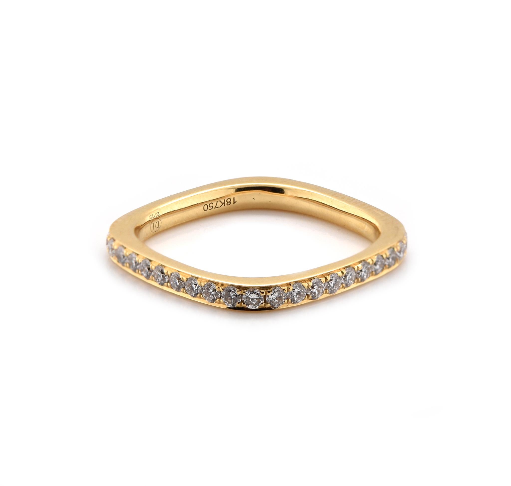 Designer: Custom
Material: 18K yellow gold
Diamonds: 40 round cut = .75cttw
Color: G
Clarity: VS2
Size: 7
Dimensions: ring measures 2.7mm in width
Weight: 2.63grams
