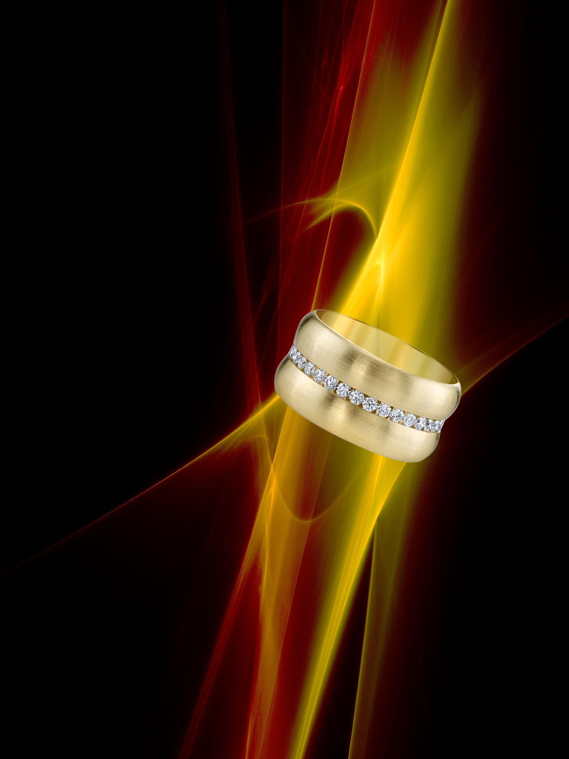Introducing a stunning ring designed to appeal to the fashion-conscious woman who values both style and practicality. This ring is crafted from 18 Karat Yellow Gold and is accented with 0.80 CT of channel set diamonds.

The delicate band of yellow