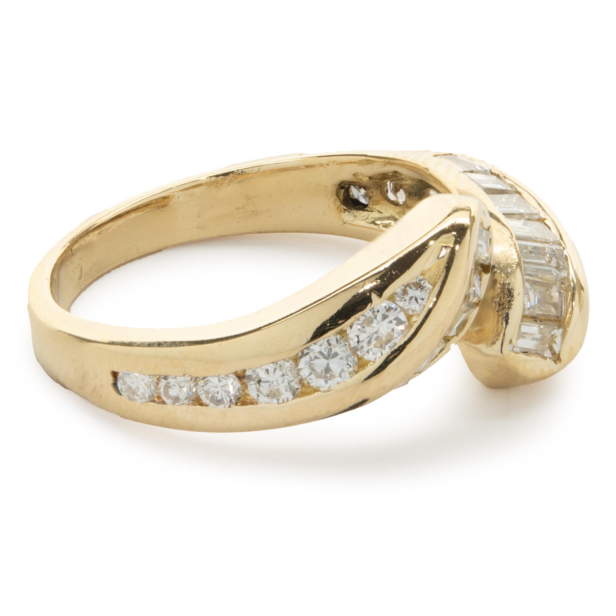 Designer: custom
Material: 18K yellow gold
Diamond: 14 round brilliant and 14 baguette cut = 1.00cttw
Color: H
Clarity: SI1
Ring size: 5.5 (please allow two additional shipping days for sizing requests)
Weight:  5.02 grams
