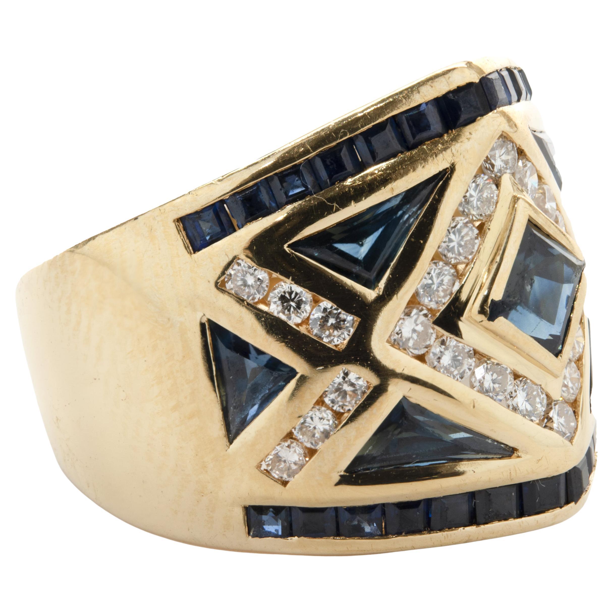 18 Karat Yellow Gold Channel Set Sapphire and Diamond Ring For Sale