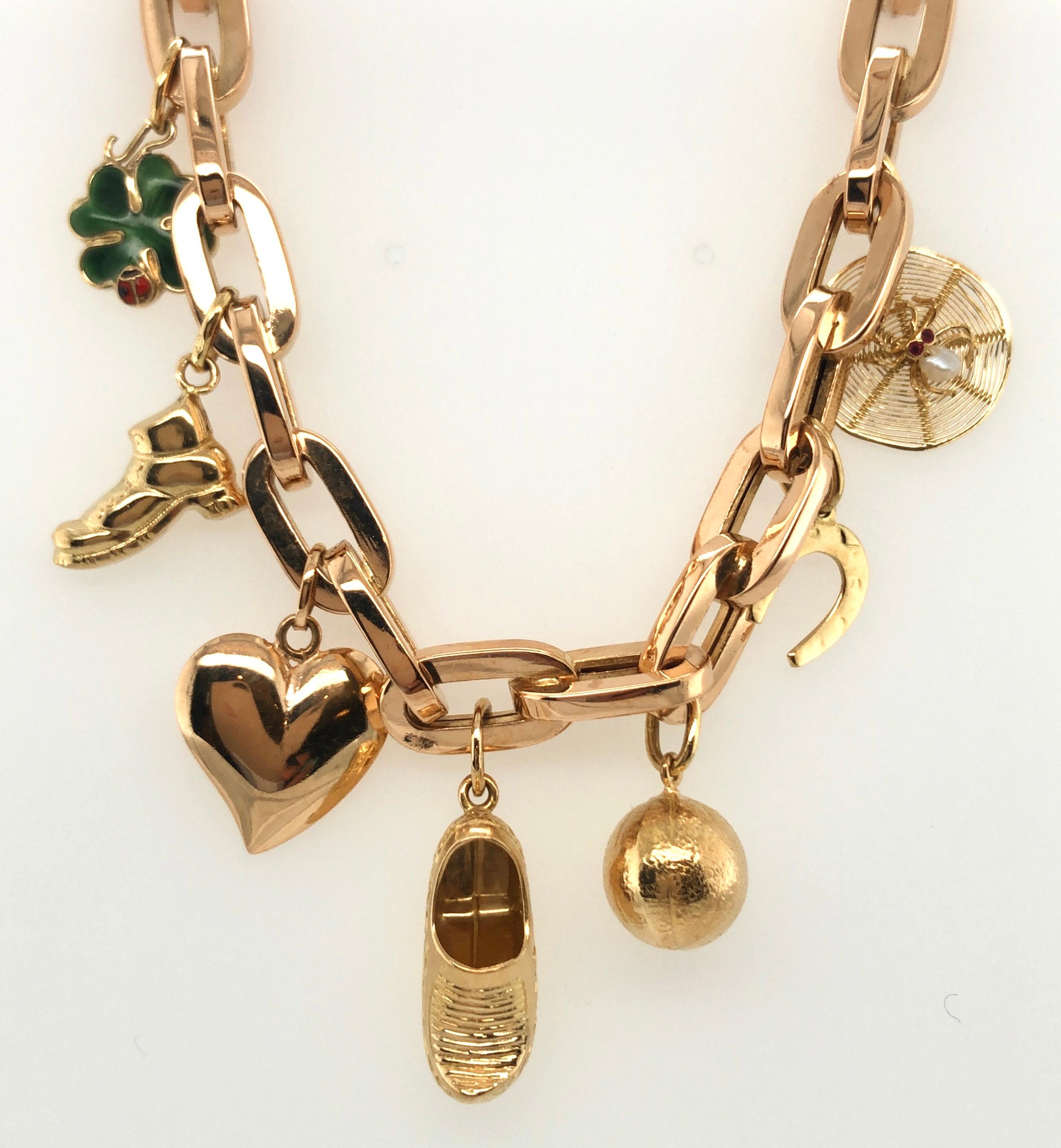 18 karat gold charm bracelet
