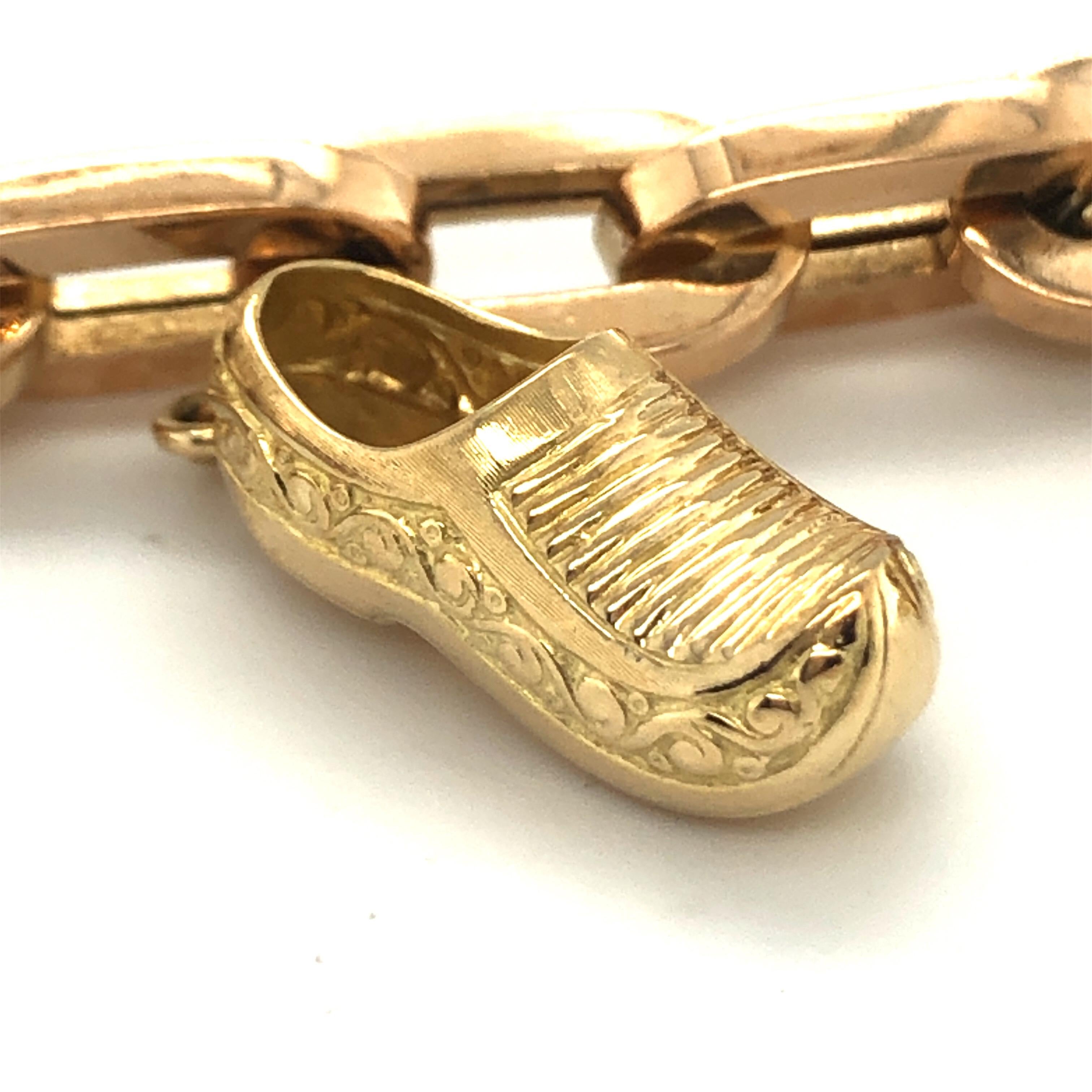 18 Karat Yellow Gold Charm Bracelet 1