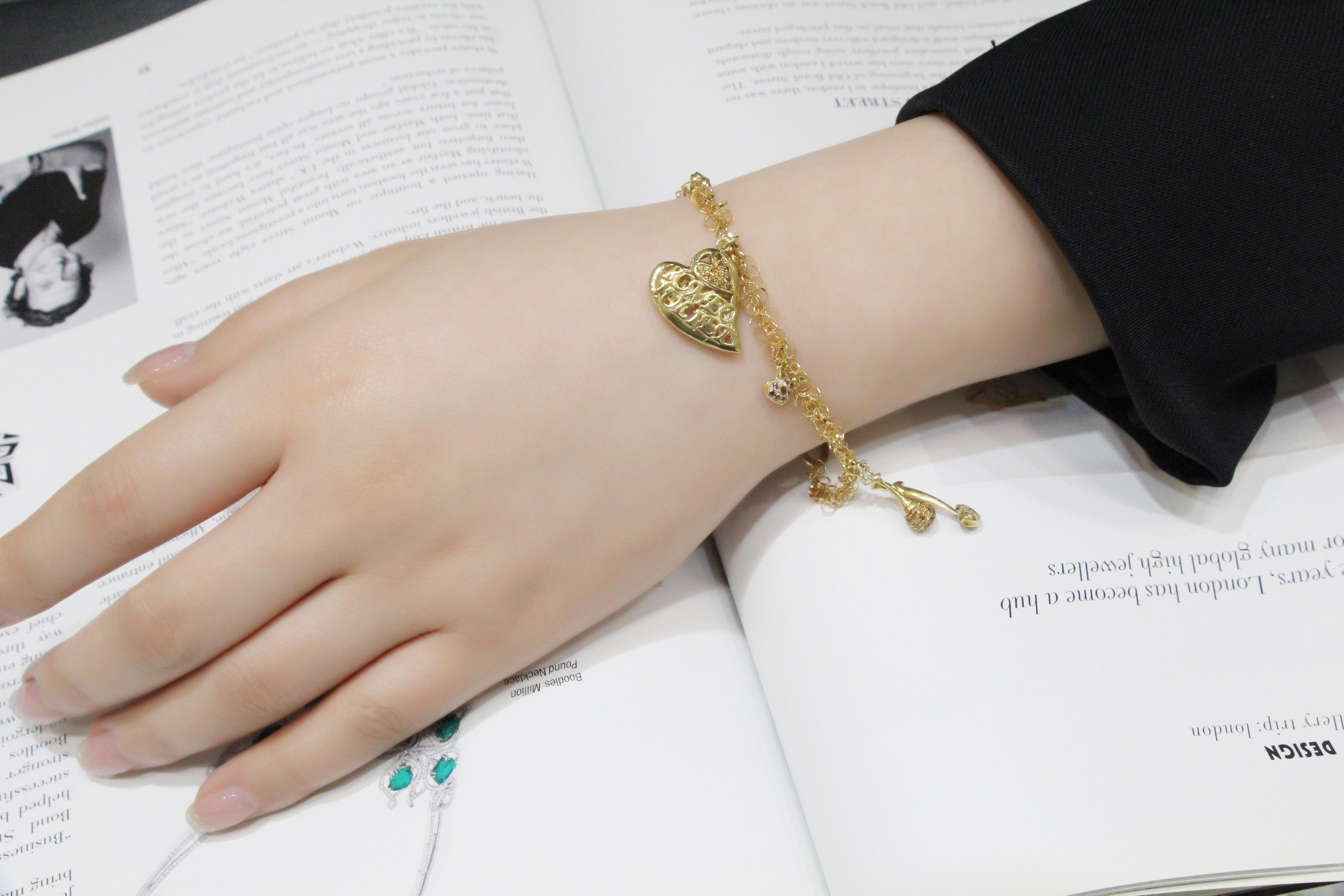 18 Karat Yellow Gold Charm Bracelet with Natural Colour Stones For Sale 1