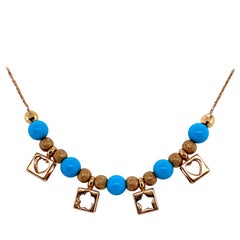 18 Karat Yellow Gold Charm Turquoise Beaded Necklace