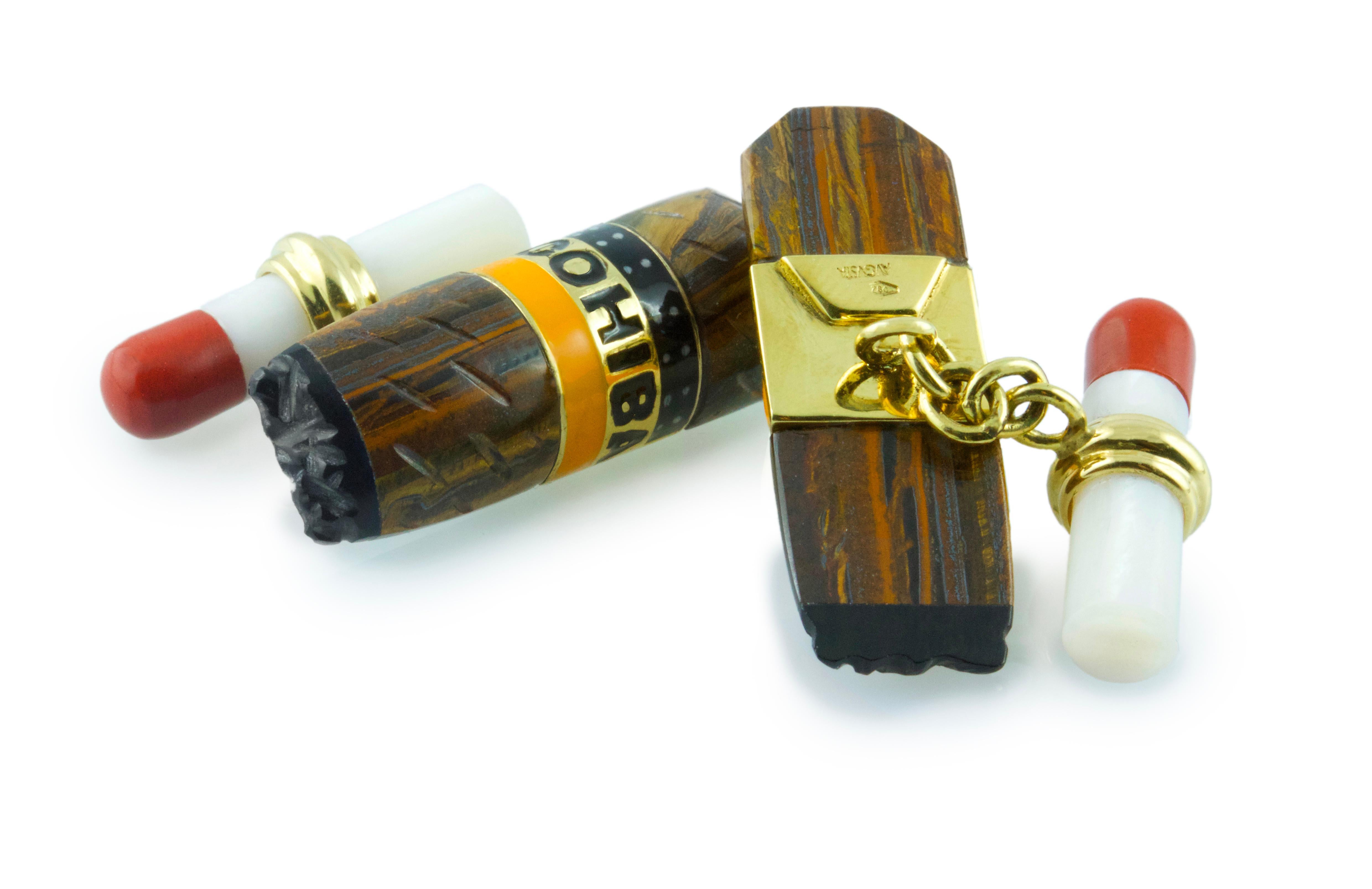 These playful cufflinks are shaped to resemble a pair of Cuban cigars with their iconic thick, cylindrical shape and a classic label reading “Cohiba”. These pieces are made of hawk eyes and enamels in the same warm shades and are mounted on 18k