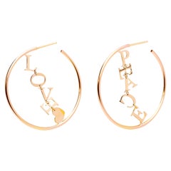 Modernist 18 Karat Yellow Gold Circle "Love and Peace" Hoops Earrings
