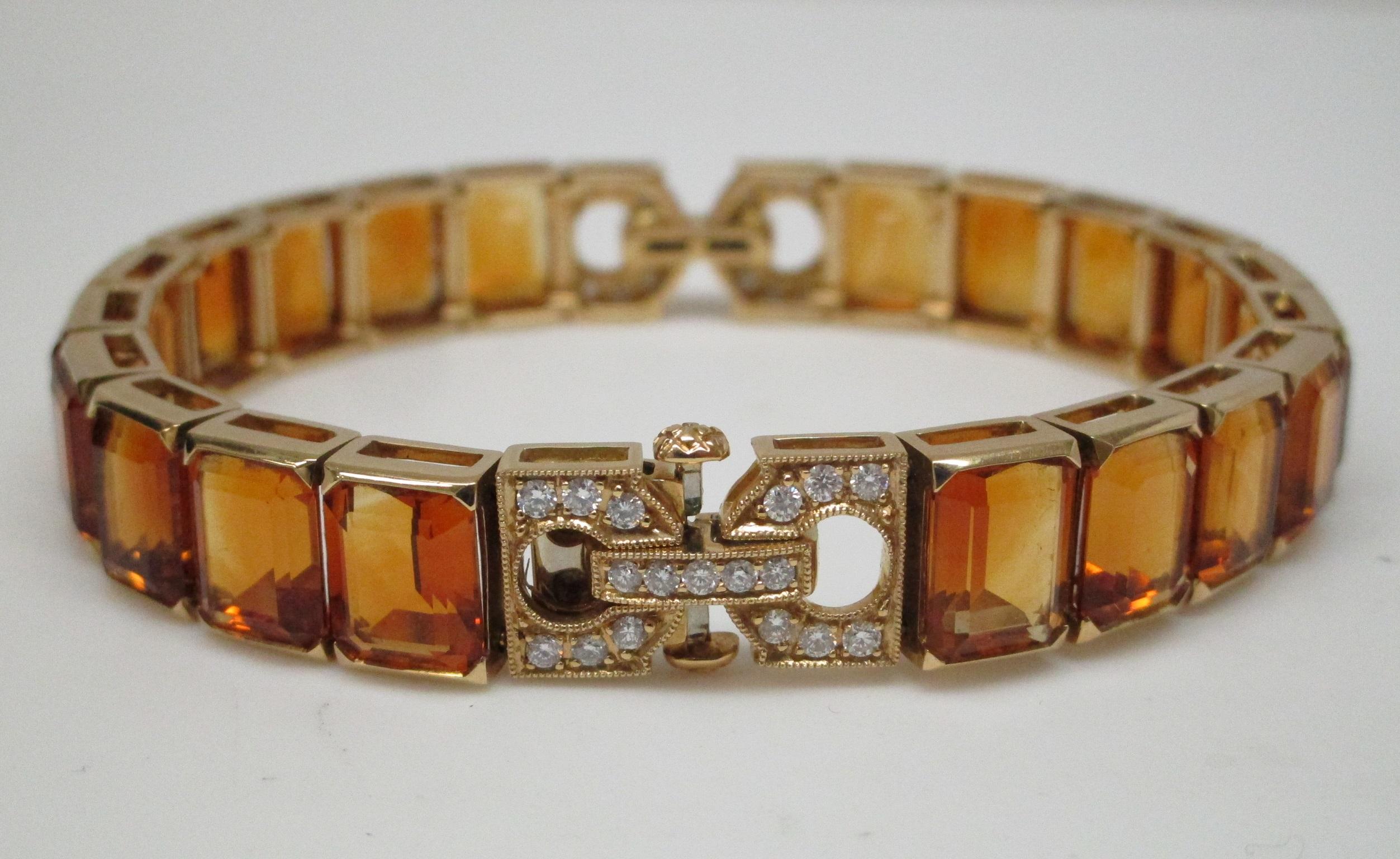 A lovely 18 Karat Yellow Gold Citrine Diamond Bracelet! This bracelet will bring a ray of sunshine into your day. It has 60 carats of Citrine and 0.40 carat worth of Diamonds, all set in 18K yellow gold. It is a joy to wear and a sight to behold. If