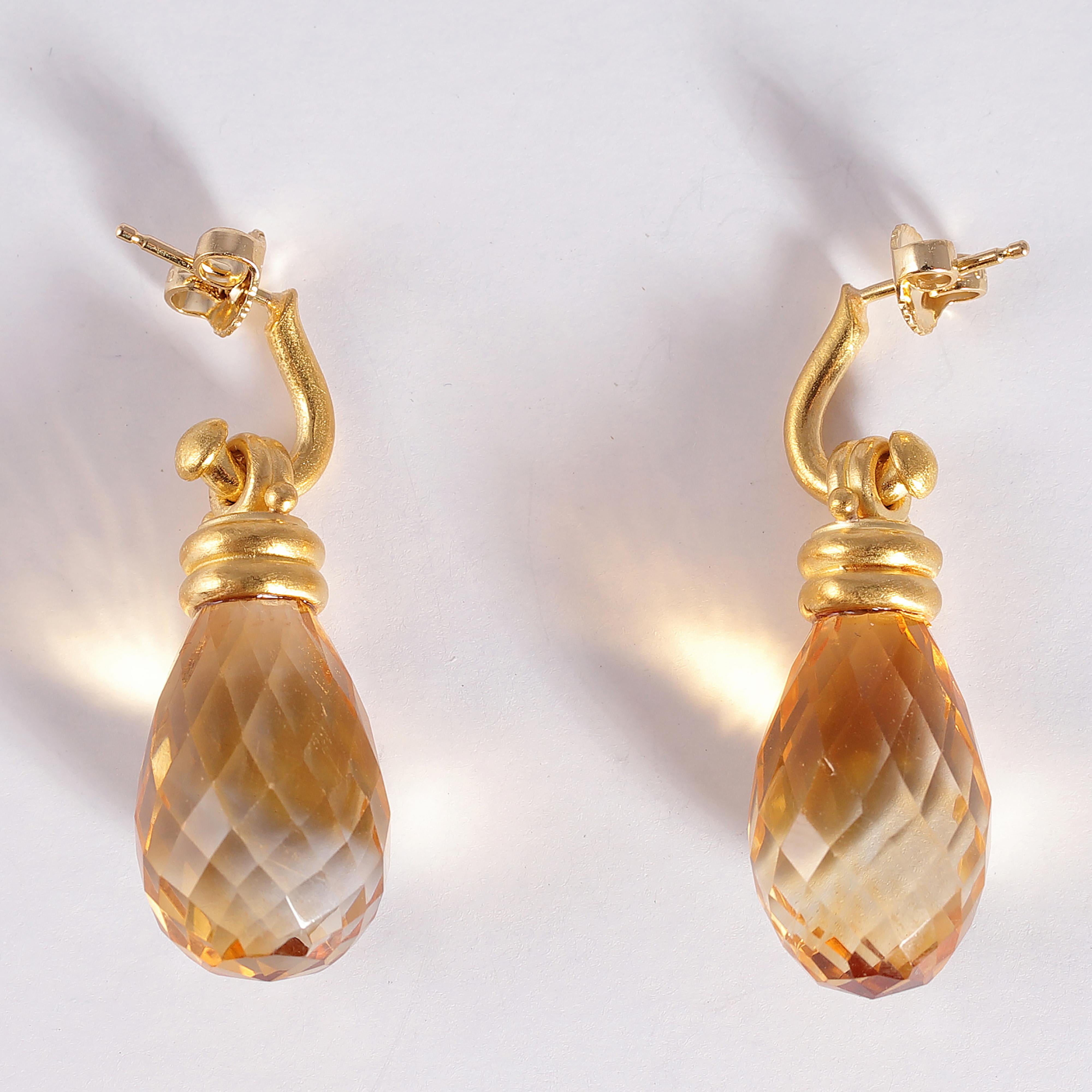 Beautiful and light!  In 18 karat yellow gold with briolette-cut citrines, secured a standard friction back.  