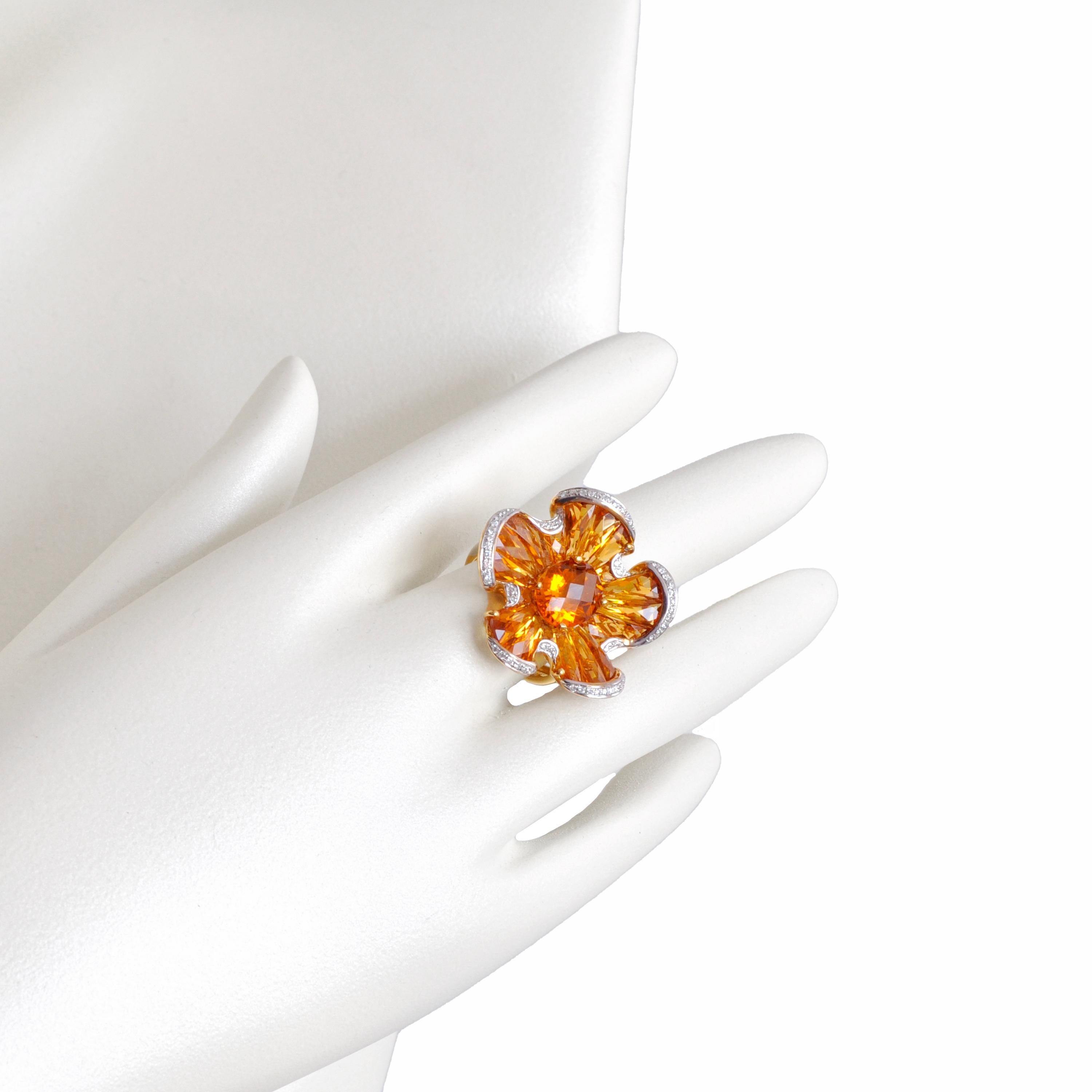 Elegance at its best, this citrine floral ring is a radiant and singularly beautiful piece that captures the essence of luxury and style. Crafted in elegant 18 karat gold, this ring showcases a prong-set citrine at its center, radiating warmth and