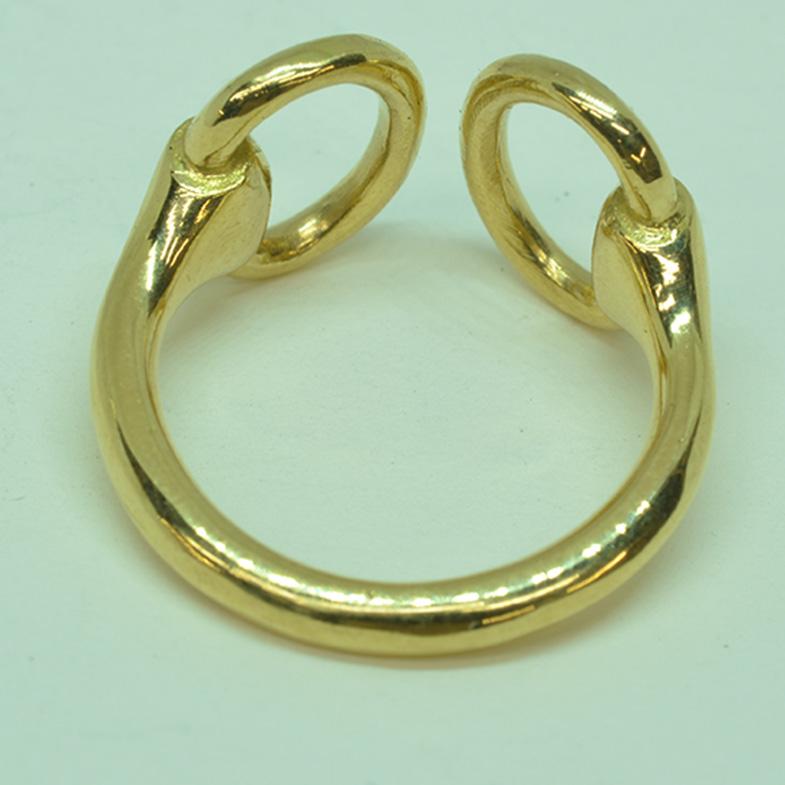 18 Karat Yellow Gold Classic Equestrian Horsebit Ring. A favorite among the the horse set for decades, this classic design has never lost it’s appeal, crafted in heavy 18 Karat gold.
