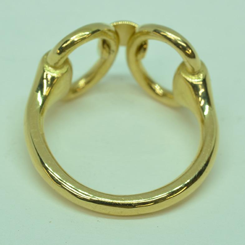 18 Karat Yellow Gold Classic Equestrian Linked Horsebit Ring. A favorite among the the horse set for decades, this classic design has never lost it’s appeal, crafted in heavy 18 Karat gold.