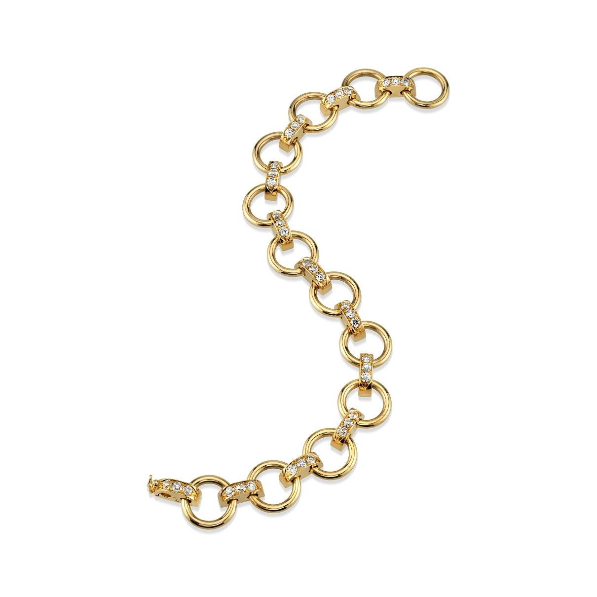 Approximately 2.00ctw G-H/VS old European cut diamonds prong set in a handcrafted 18K yellow gold link bracelet.

Bracelet measures 7.5