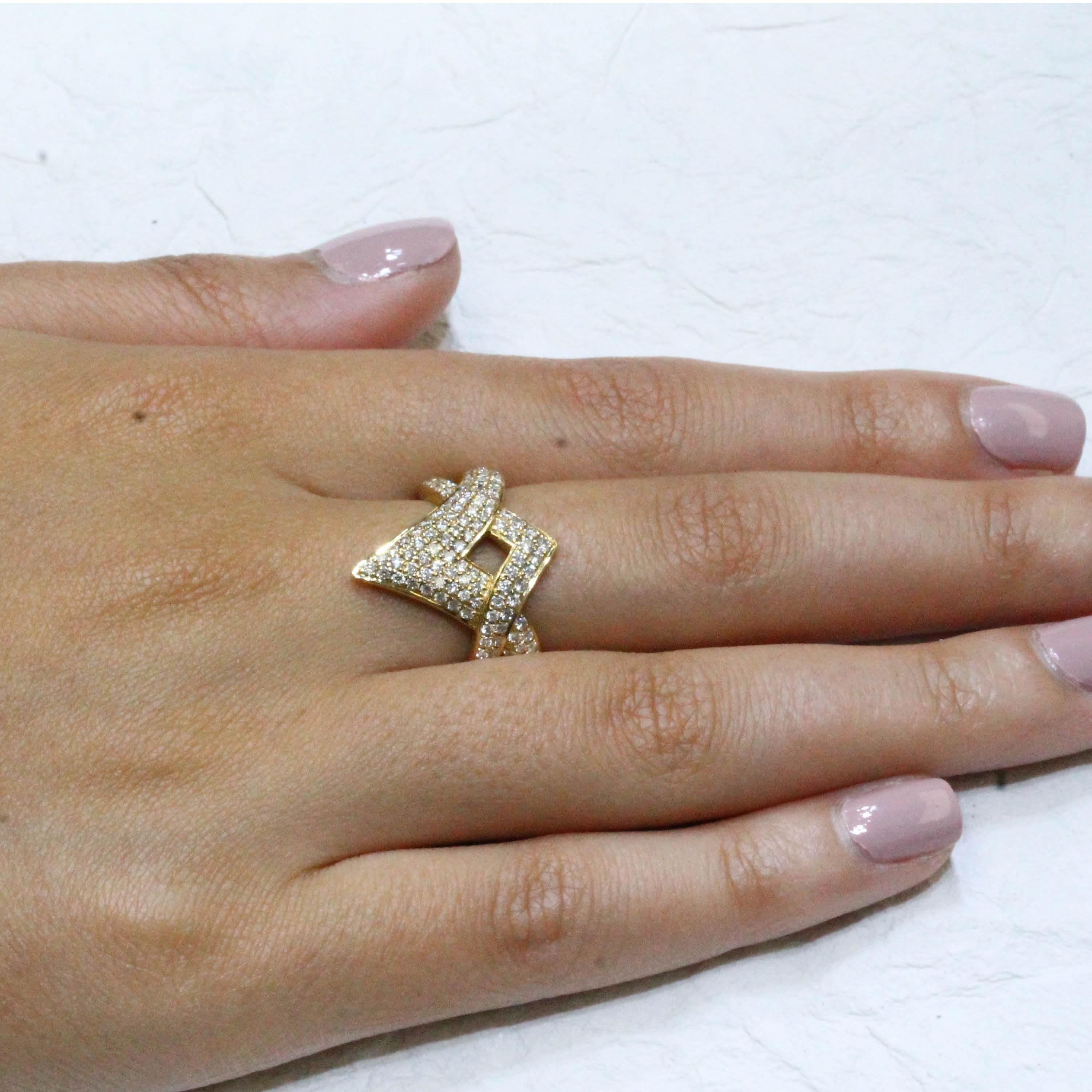 One-of-a-Kind 18K Yellow Gold Cocktail Ring featuring nearly 1 carat of Sparkling White Diamonds Finger size 6.5, adjustable upon request/quote. Item ref. R7690.

Stone Information:
- 156 Round White Diamonds totaling 0.88 ct. G-H Color, SI