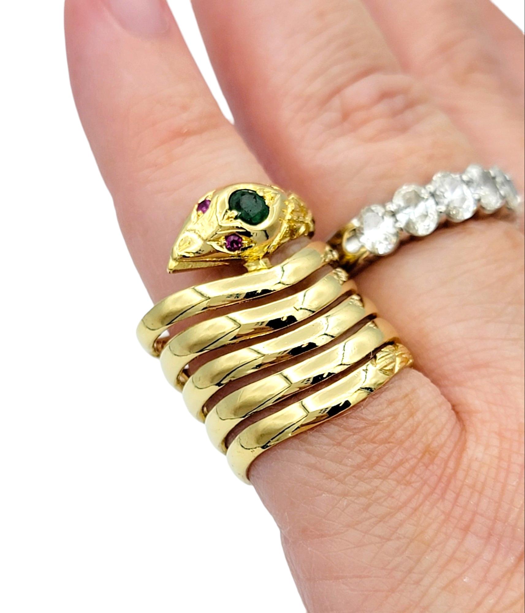 18 Karat Yellow Gold Coiled Snake Bypass Cocktail Ring with Emerald and Rubies For Sale 1