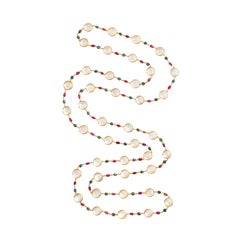 18 Karat Yellow Gold Coin Pearl Blue Topaz and Pink Tourmaline Necklace