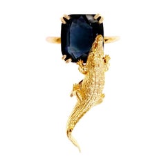 Eighteen Karat Yellow Gold Contemporary Cocktail Ring with Cushion Dark Sapphire