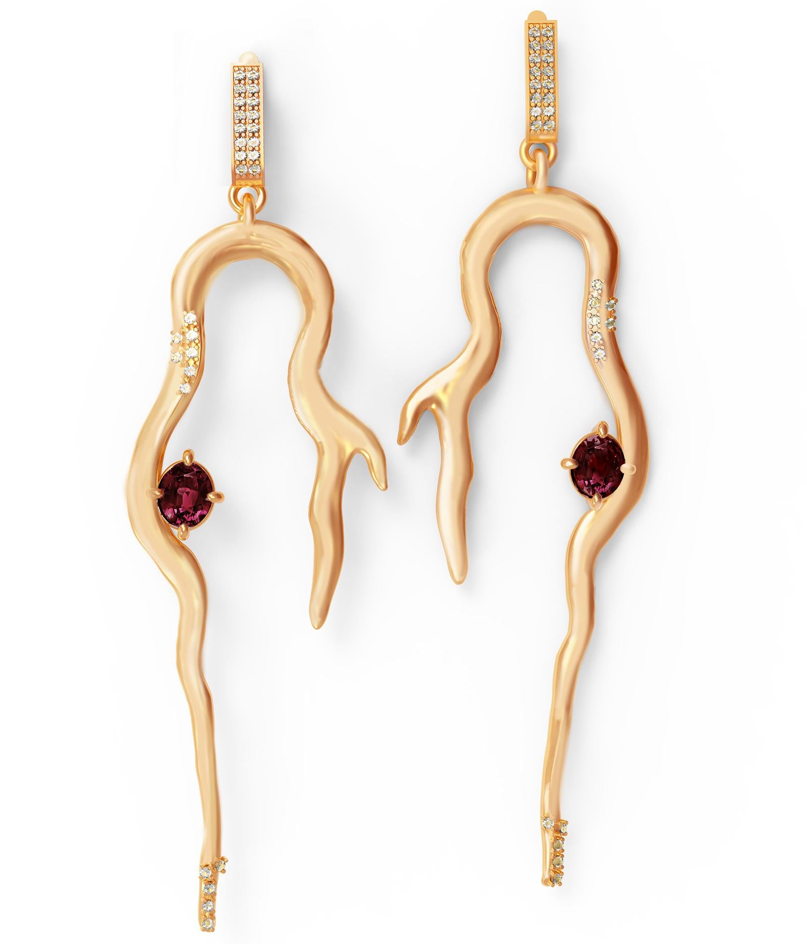 These contemporary 18 karat yellow gold cocktail earrings are encrusted with natural round diamonds and wine red oval sapphire and matching Malaya garnet. Pine jewellery collection was featured in Vogue UA, Another UK, Interview, and other